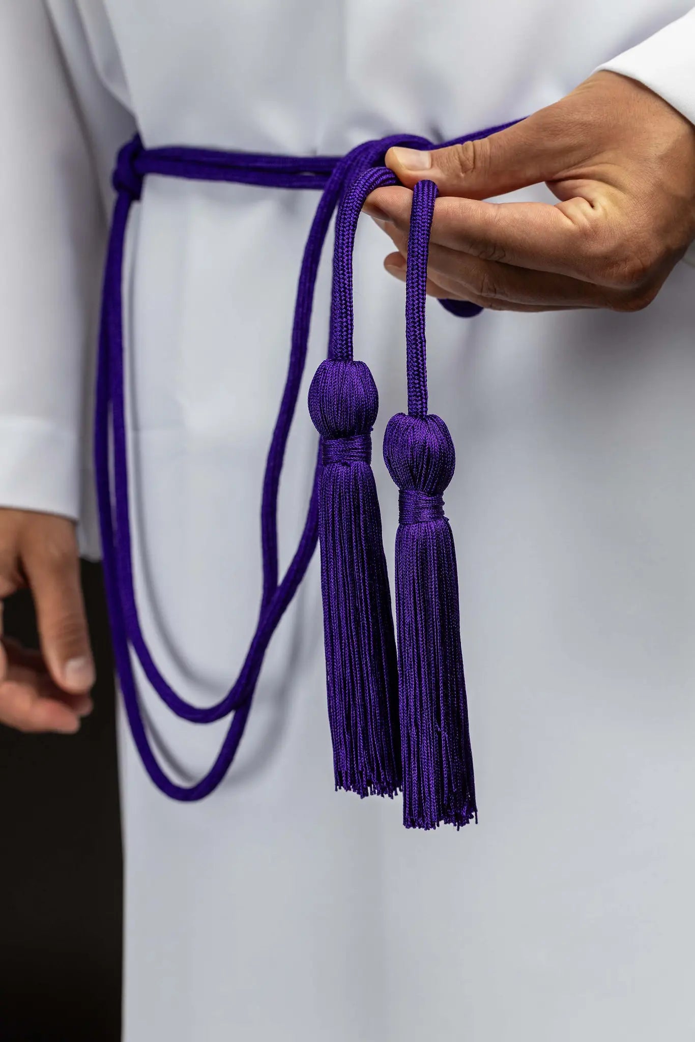 Purple braided liturgical cincture with long tassels