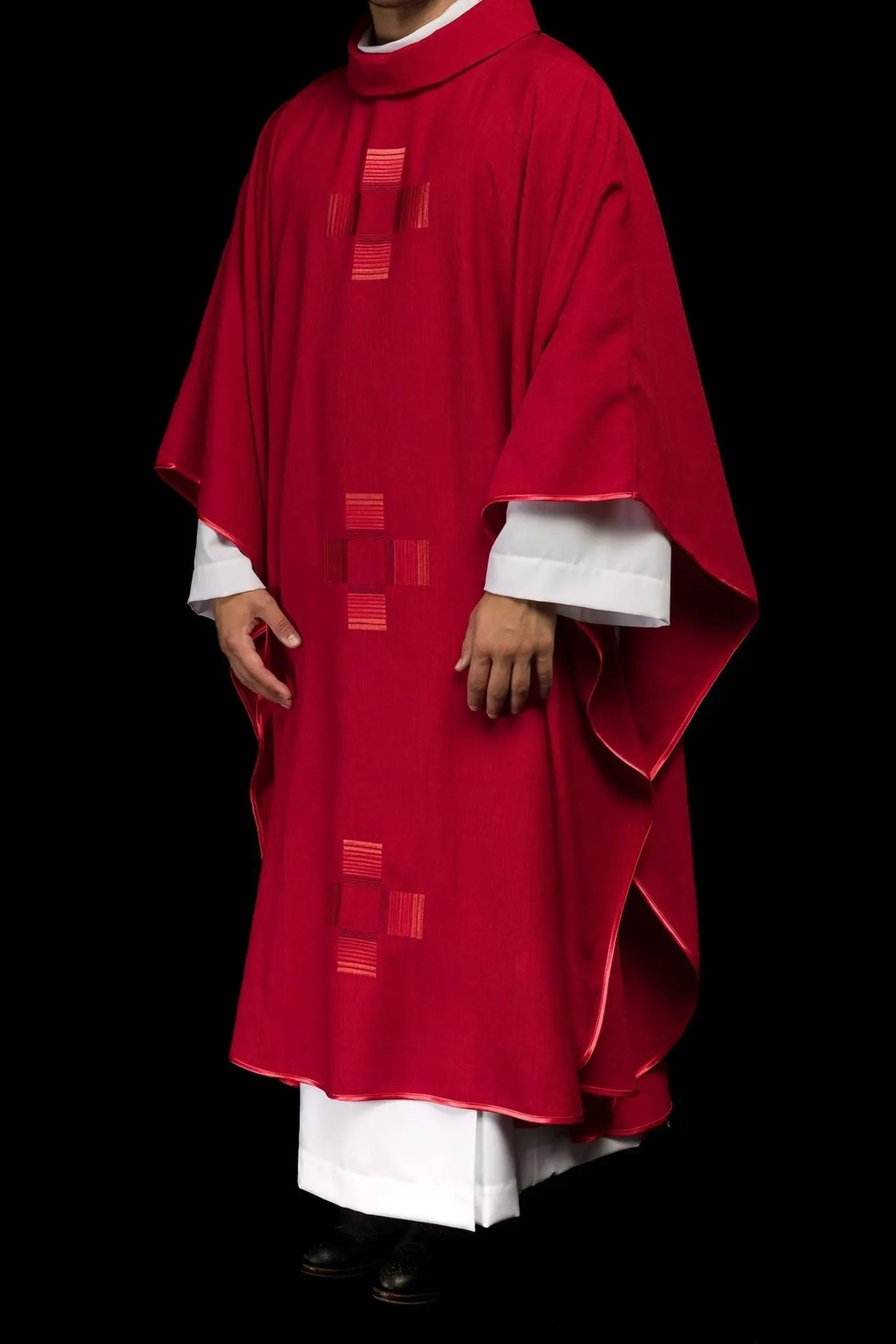 Red chasuble with embroidered crosses