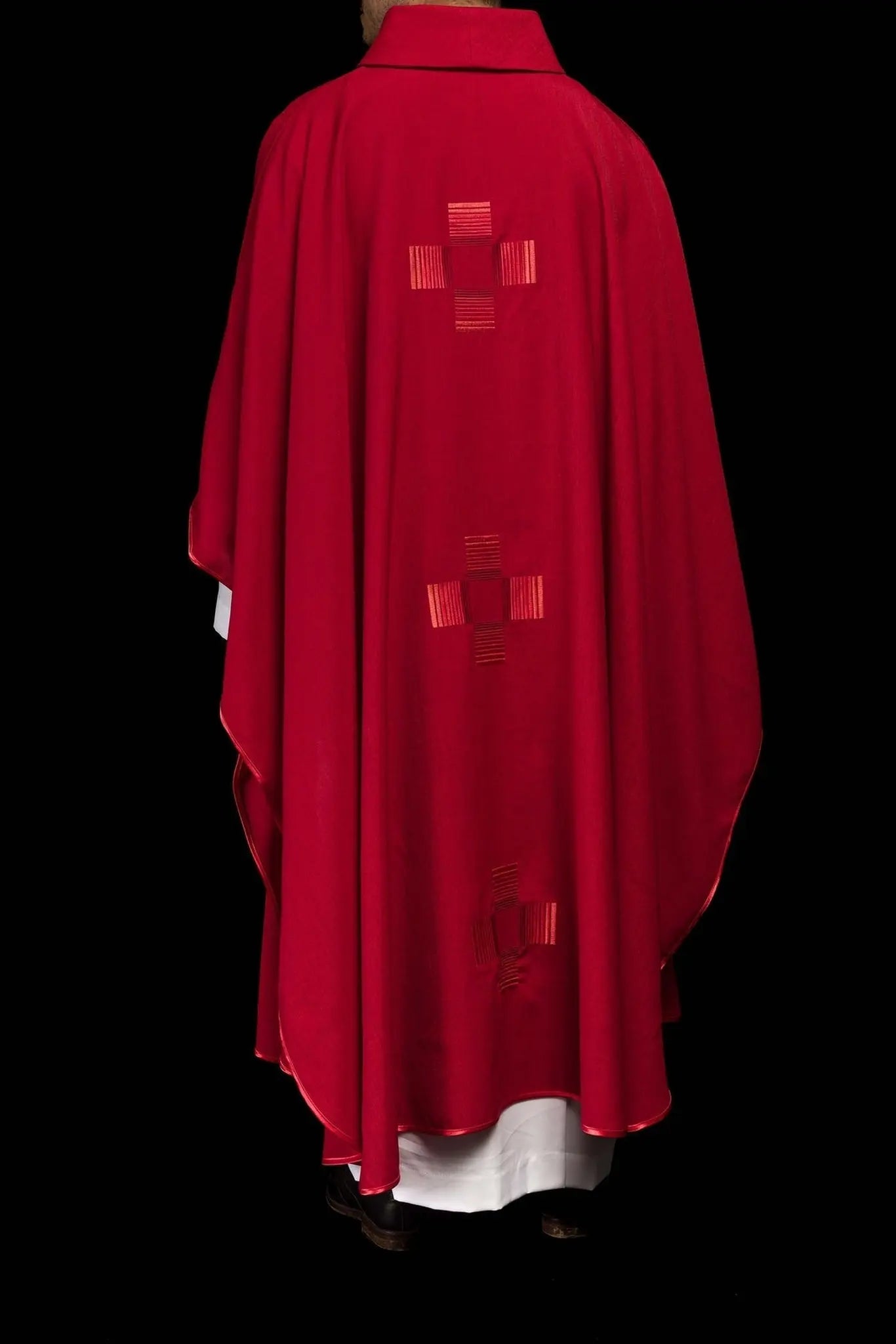 Red chasuble with embroidered crosses