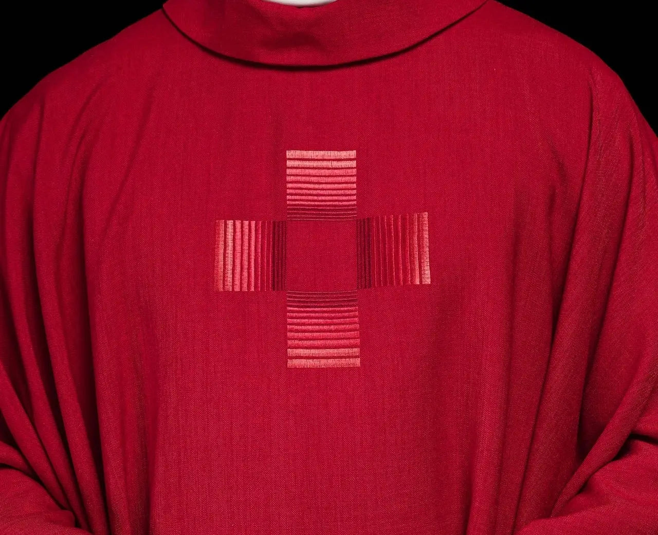 Red chasuble with embroidered crosses