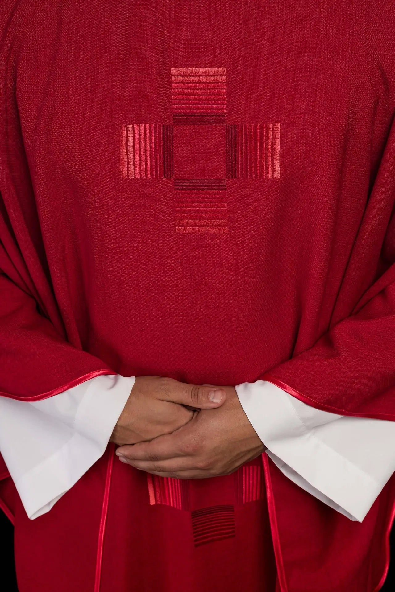 Red chasuble with embroidered crosses