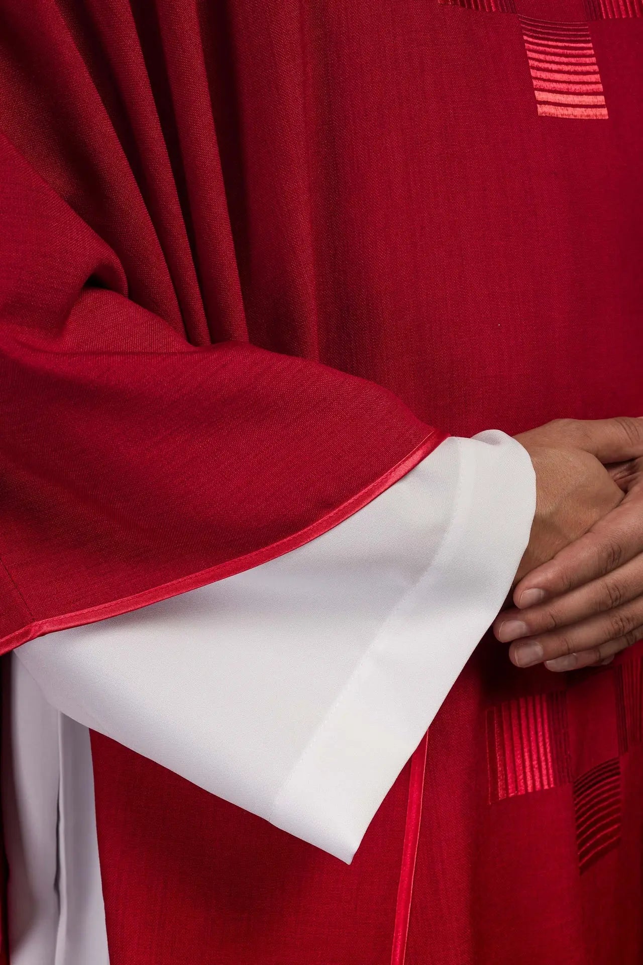 Red chasuble with embroidered crosses