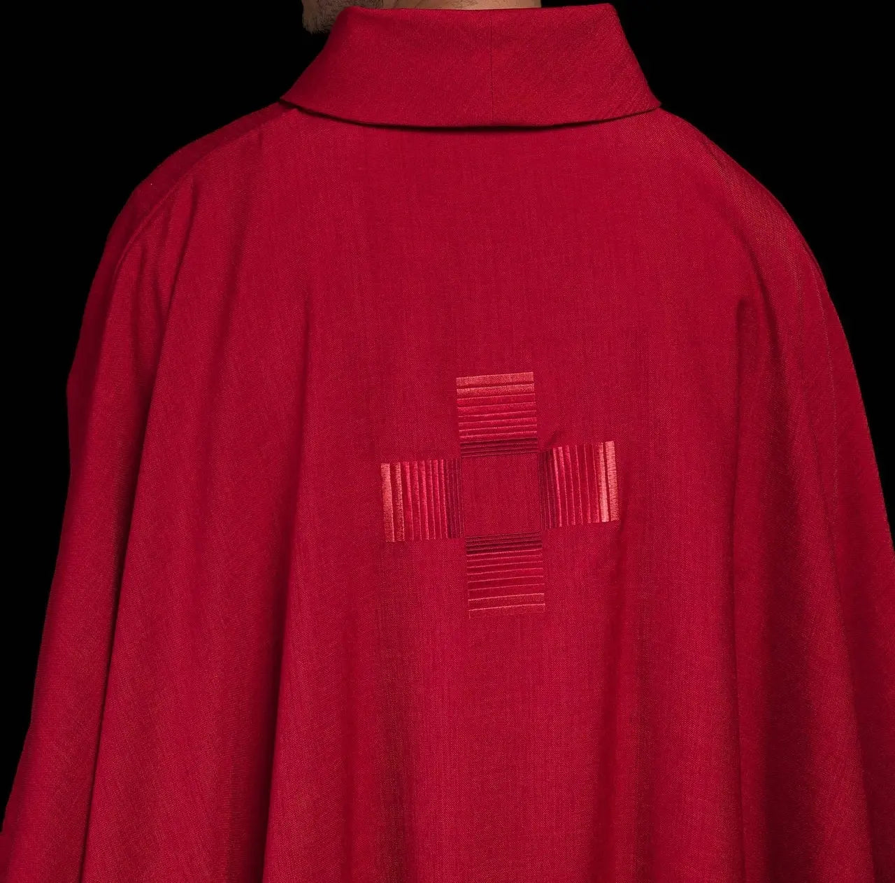Red chasuble with embroidered crosses