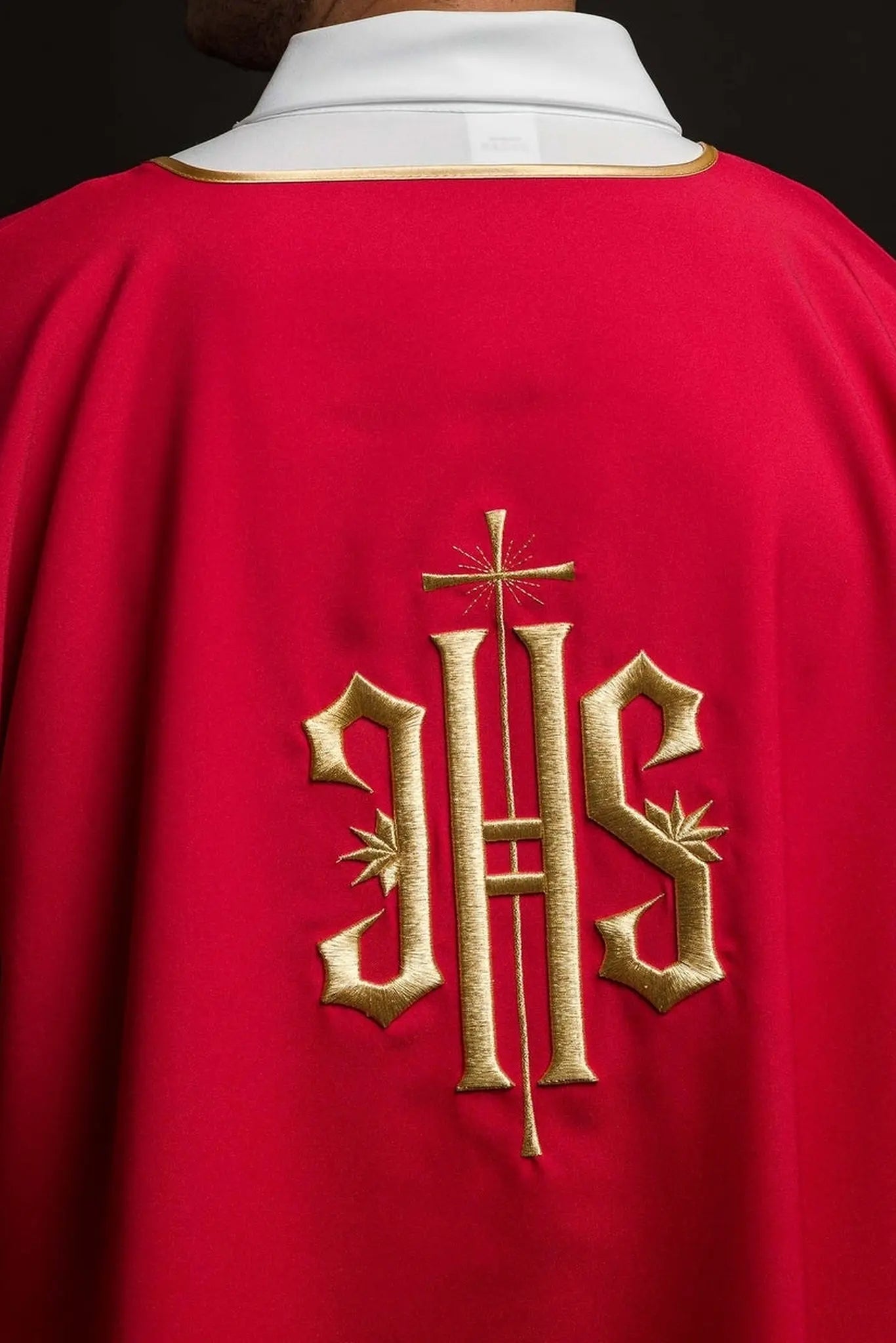 Red Dalmatics with embroidered gold IHS