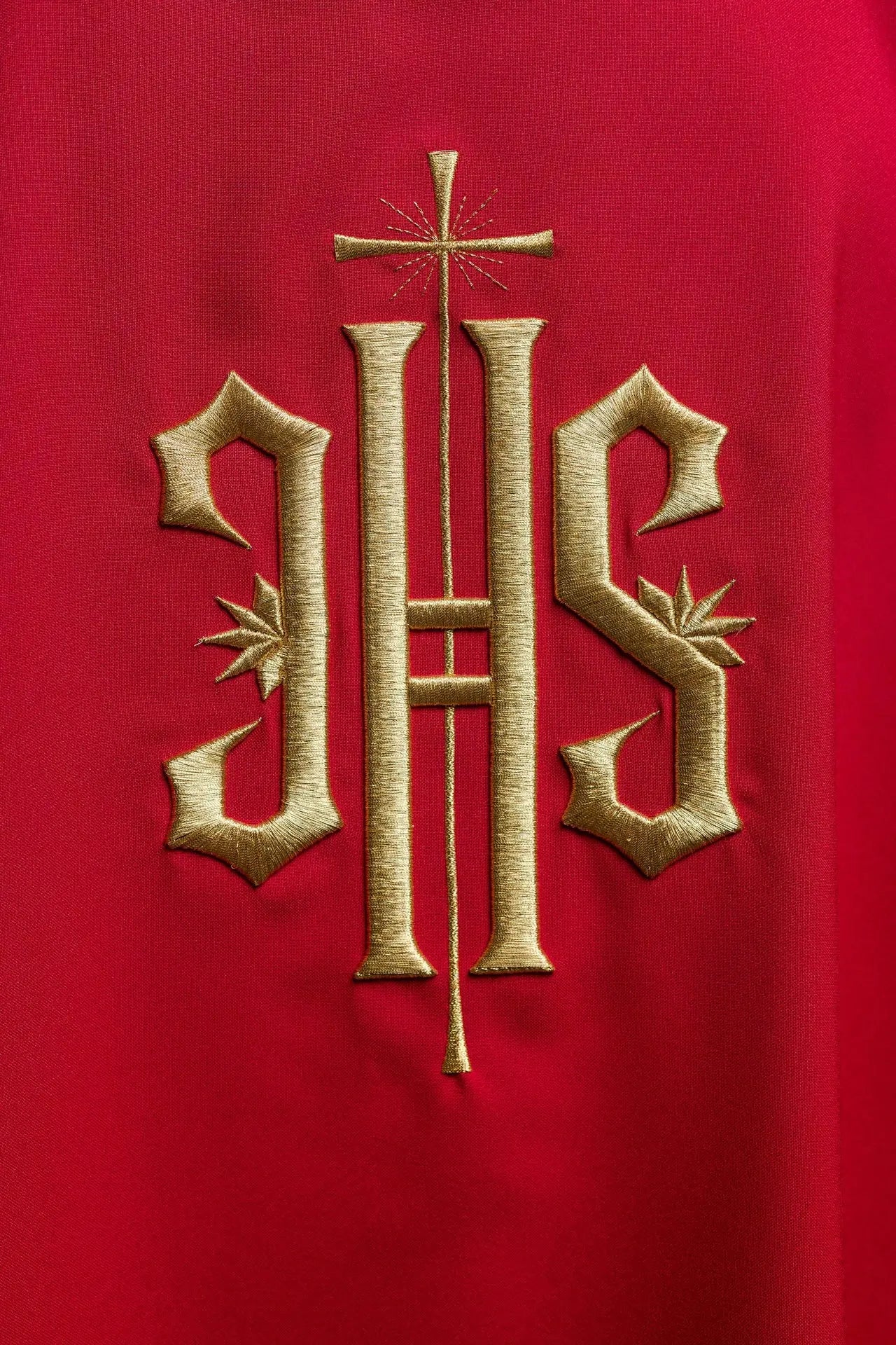 Red Dalmatics with embroidered gold IHS