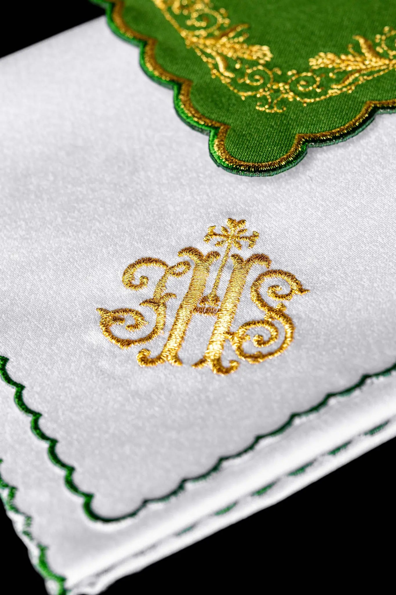 Green chalice linen set with IHS monogram, cross, acanthus leaves, and grapevines embroidered in gold. Includes pall, corporal, purificator, and lavabo towel.