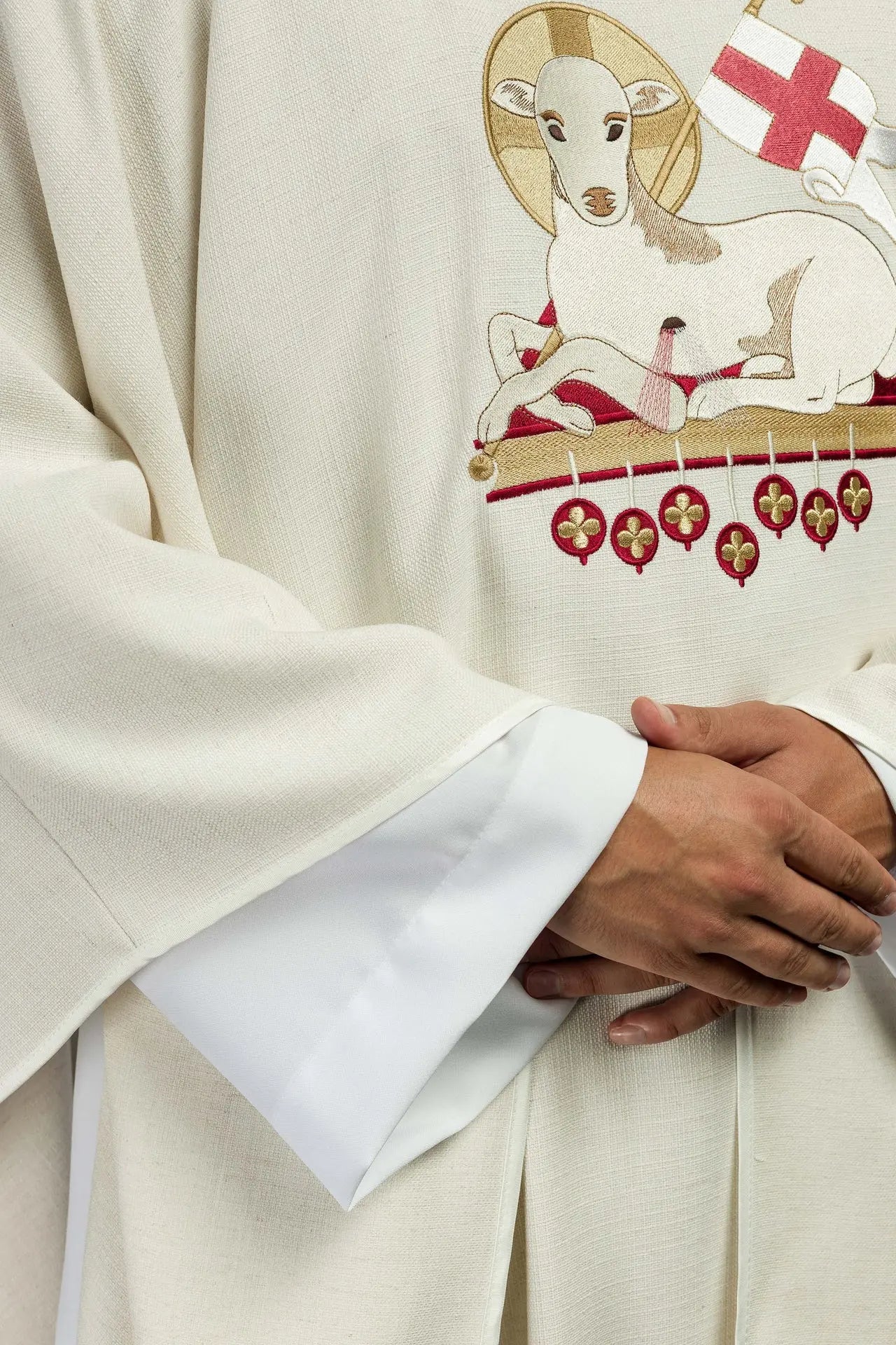 Easter chasuble sewn from natural fabric with an embroidered lamb
