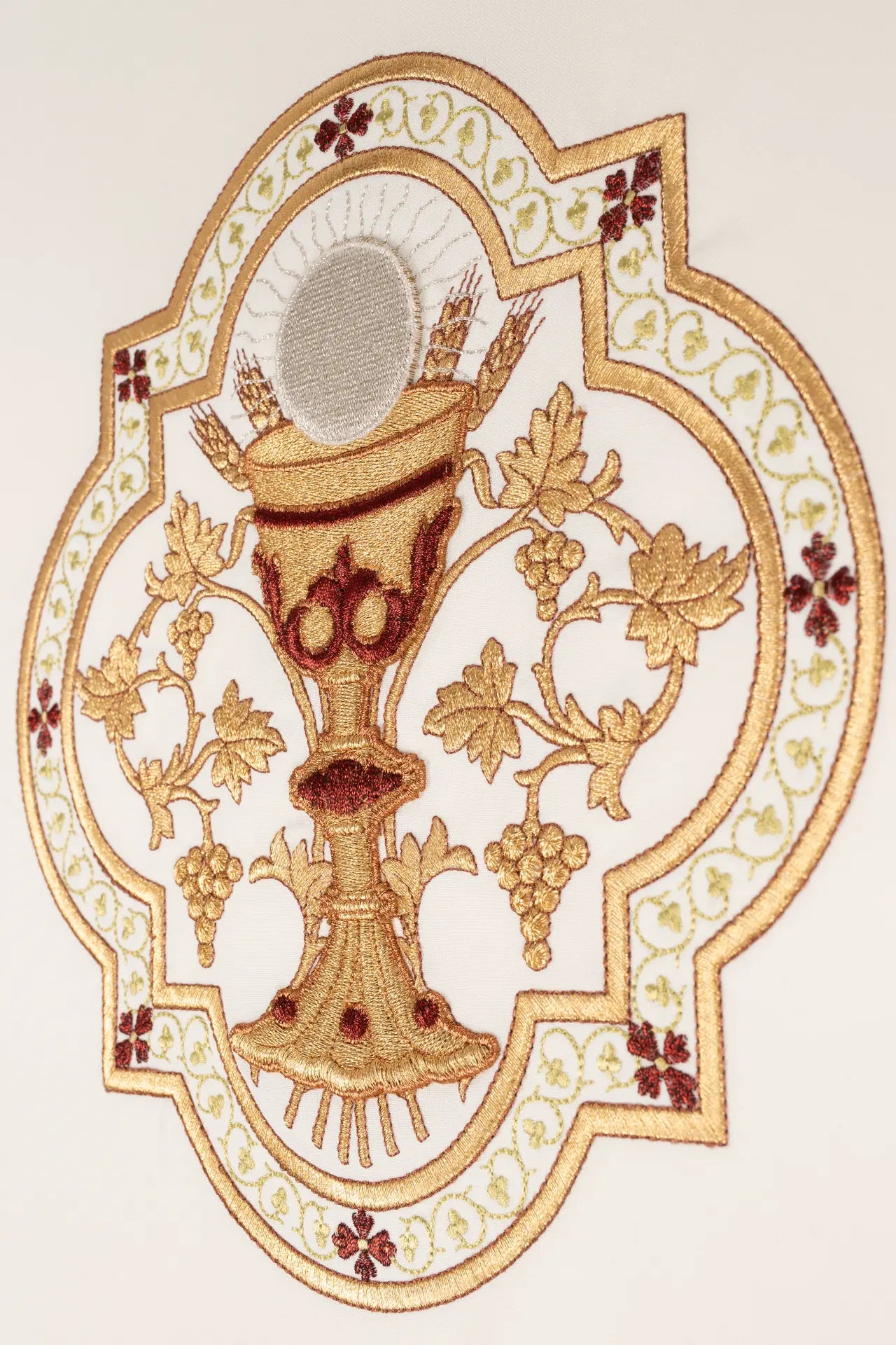 Embroidered chasuble with a motif of the Eucharistic Chalice and IHS