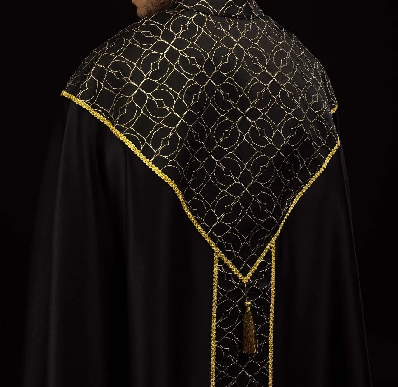 Embroidered black cope decorated with jacquard fabric