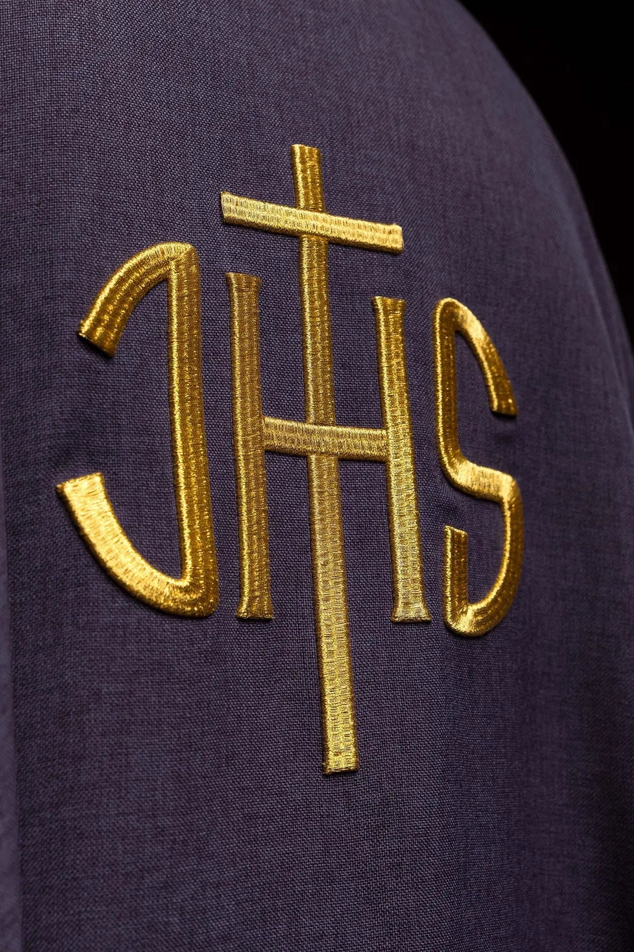 Purple liturgical chasuble with gold IHS embroidery