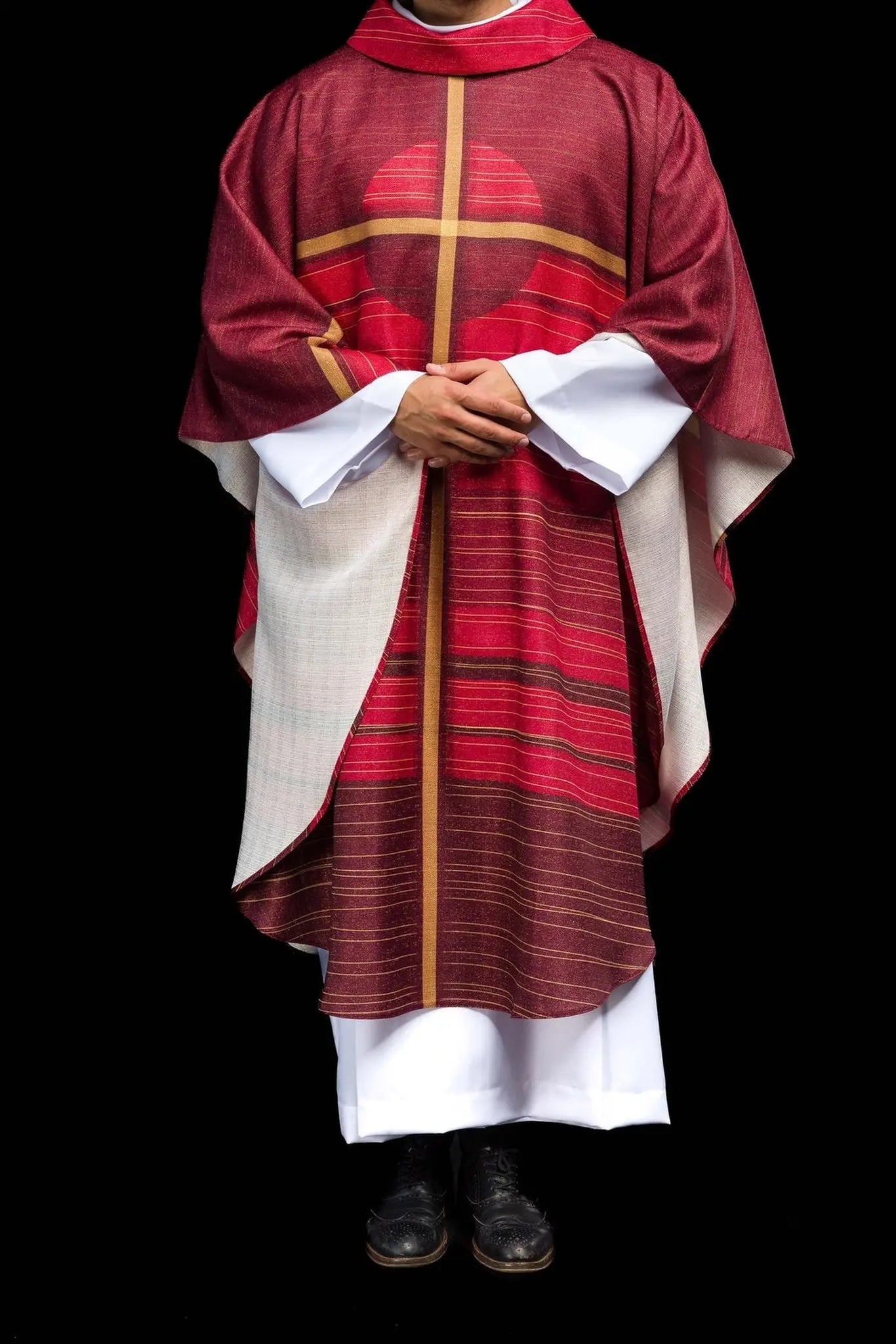 Red printed chasuble with a cross motif
