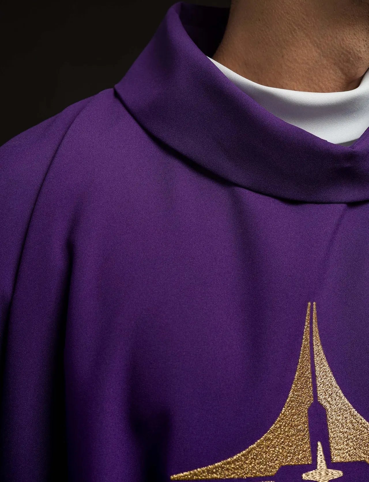 Purple chasuble embroidered with cross motif