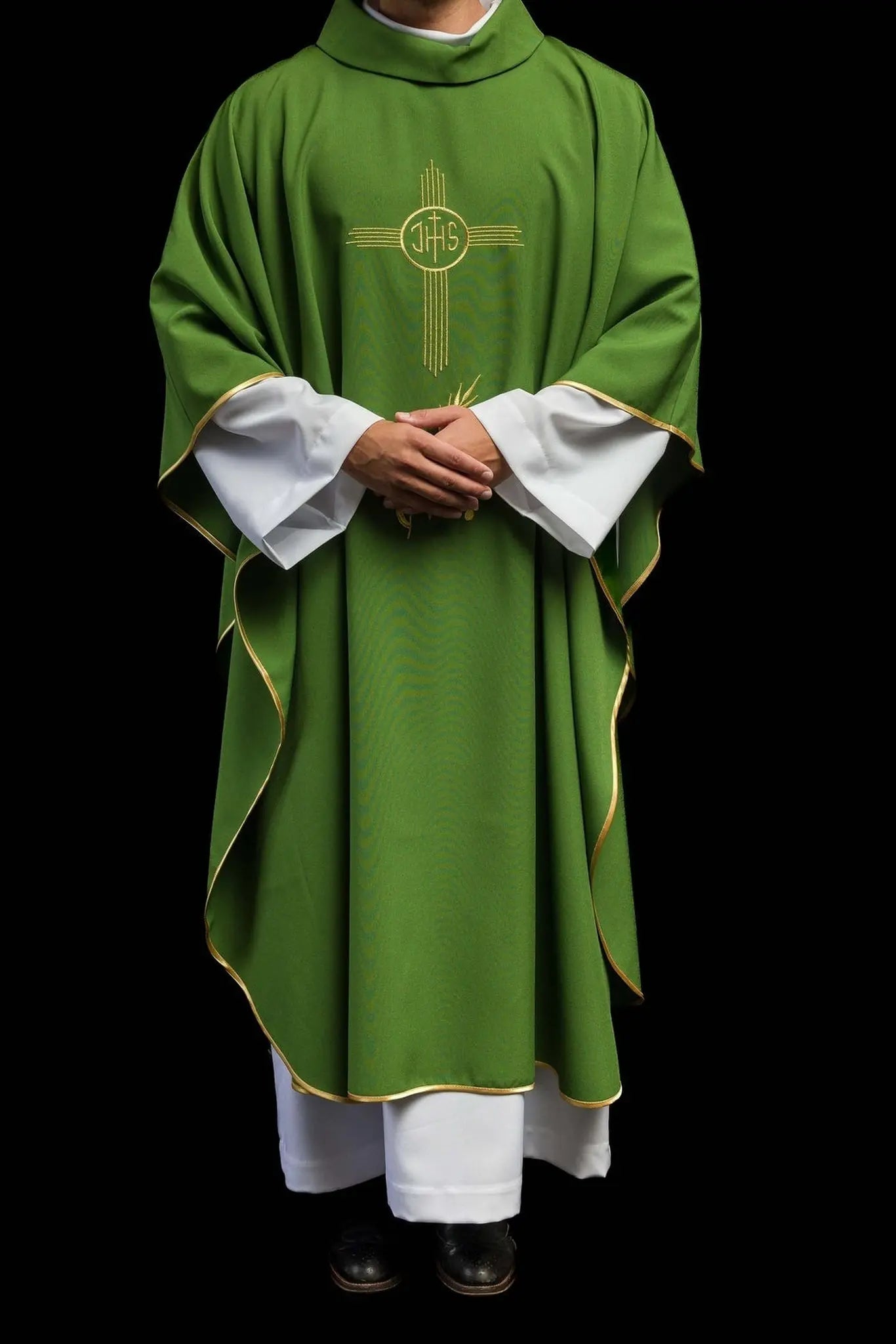 Green chasuble embroidered with IHS motif
