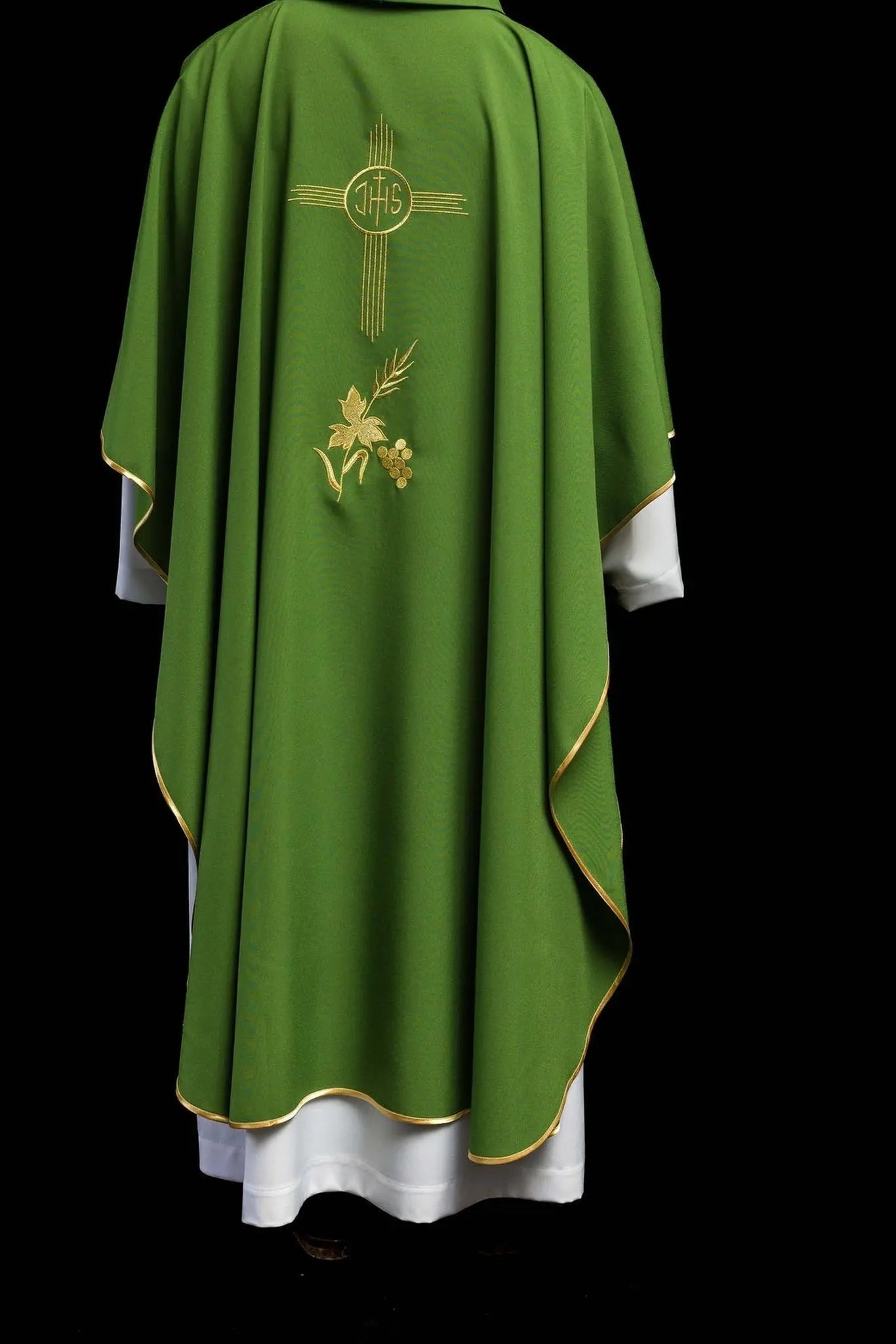 Green chasuble embroidered with IHS motif
