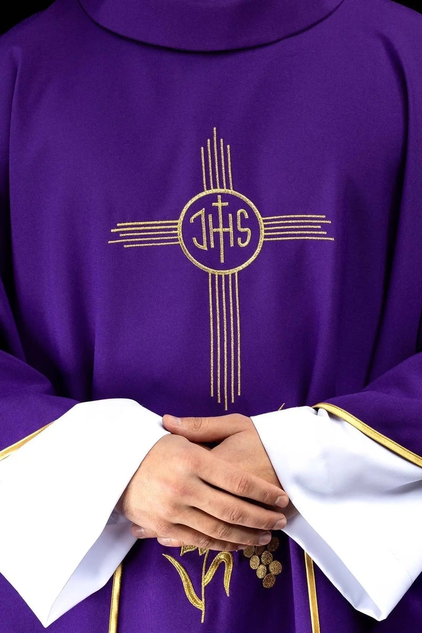 Purple chasuble embroidered with IHS motif