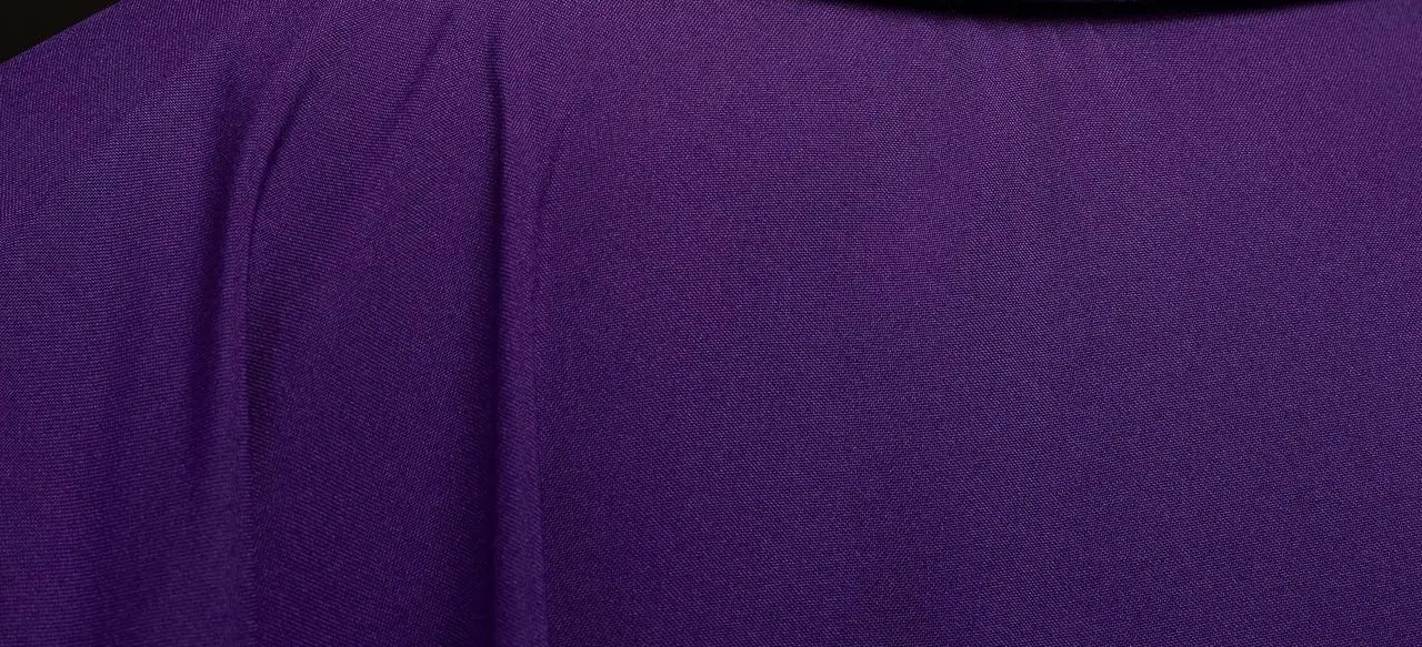 Purple chasuble with gold cross embroidery