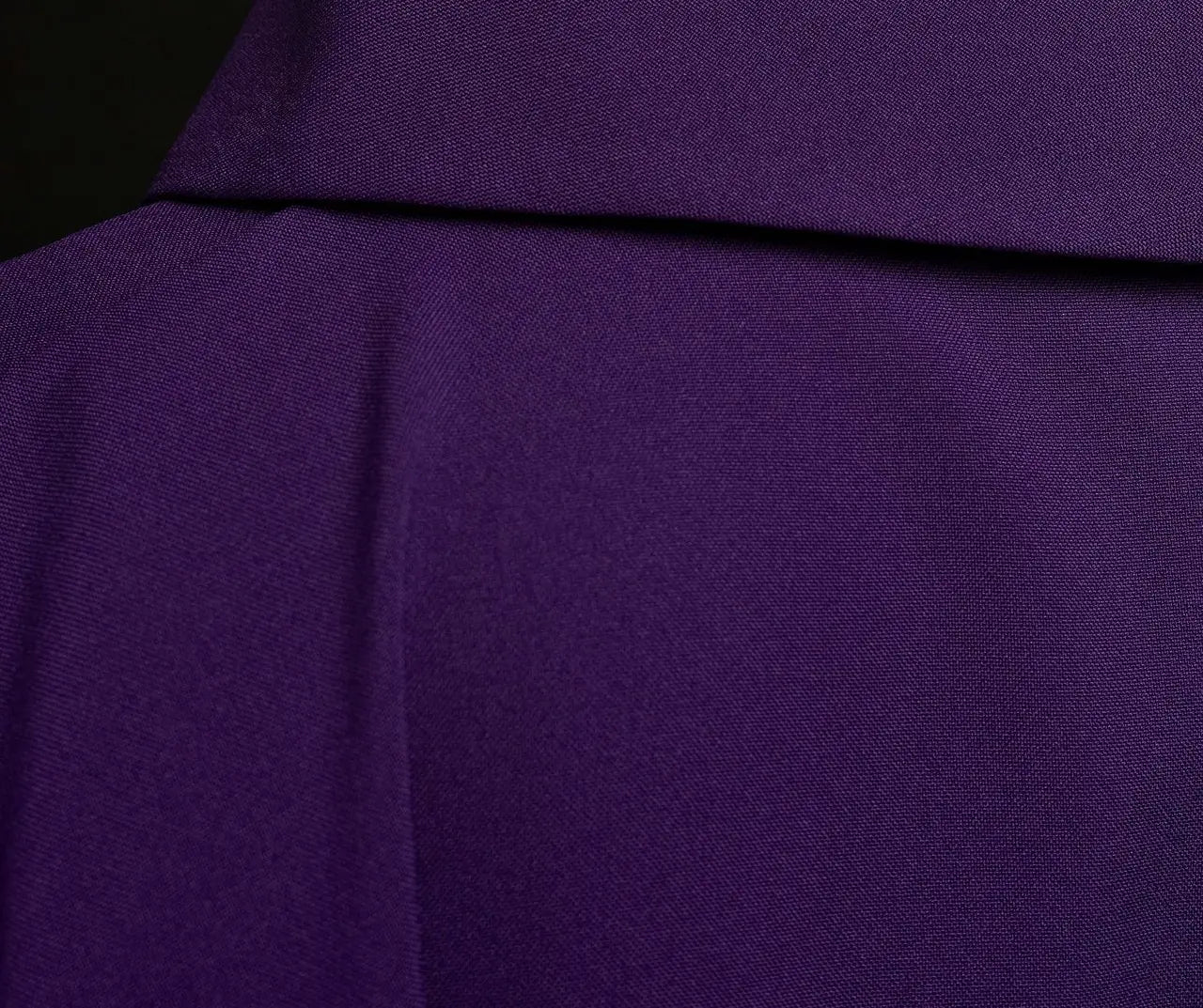 Purple chasuble with embroidery of the cross and gold piping