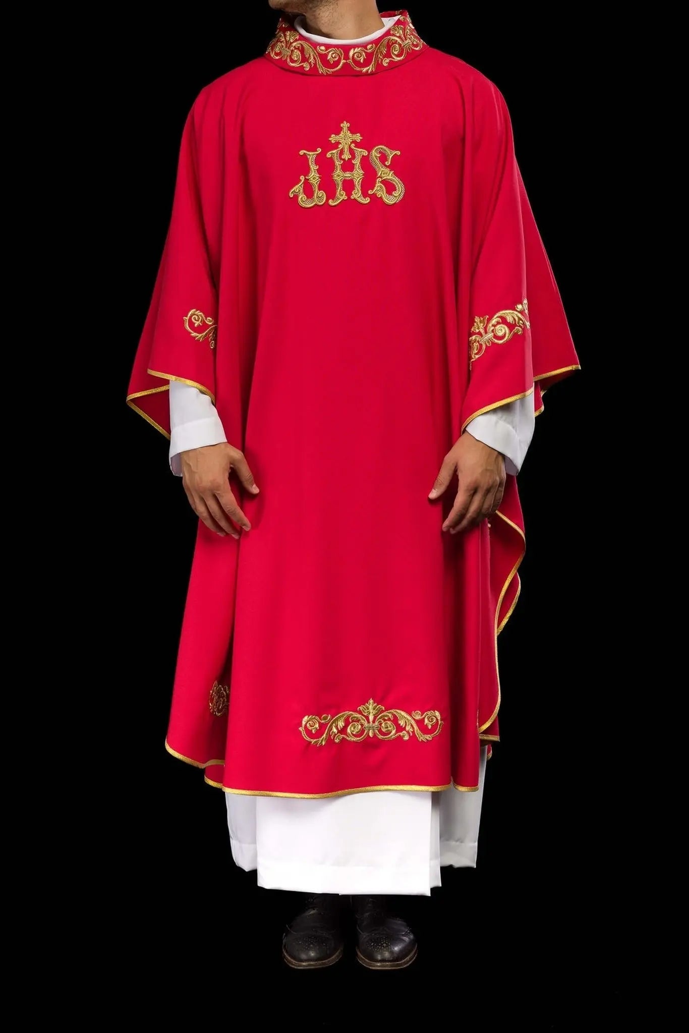 Red chasuble with gold IHS embroidery and decorative trim