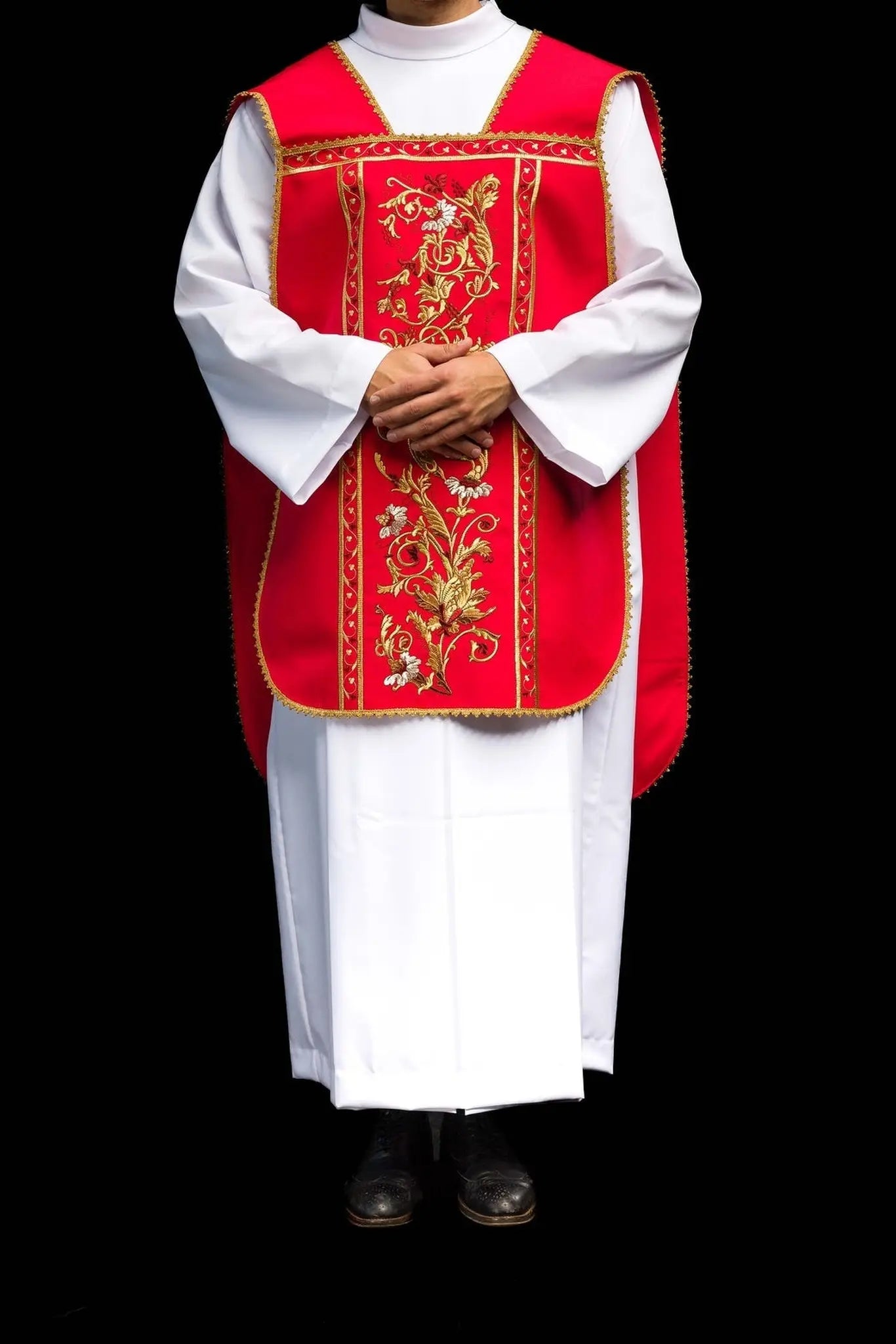 Red Roman chasuble embroidered with IHS motif