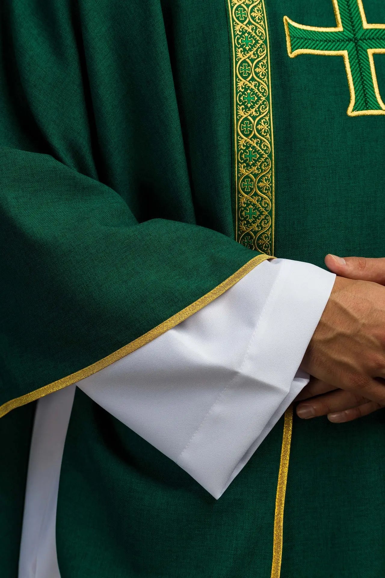 Green liturgical chasuble with embroidered cross and jacquard bands