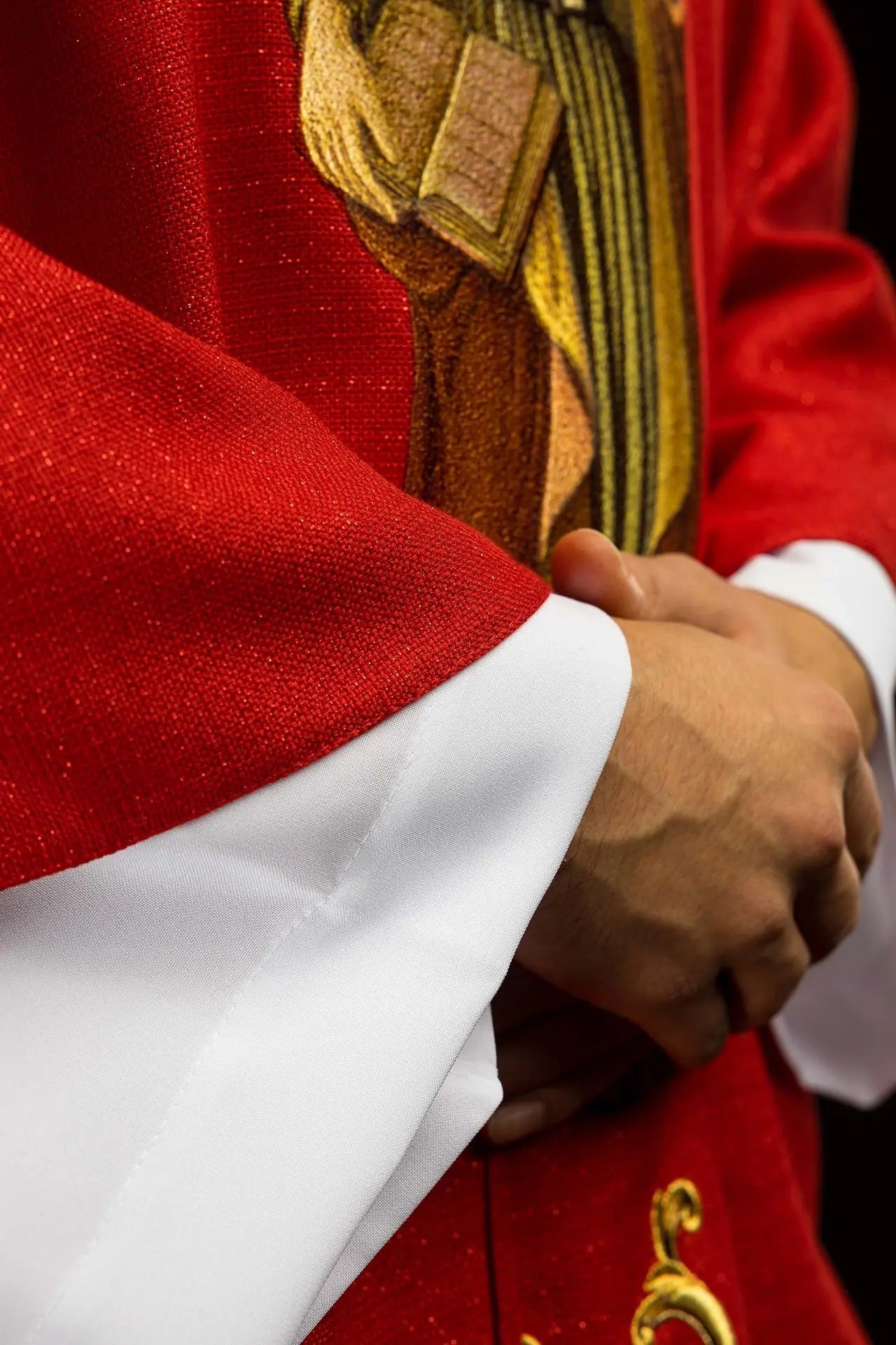 Richly embroidered chasuble with the image of Saint Peter red