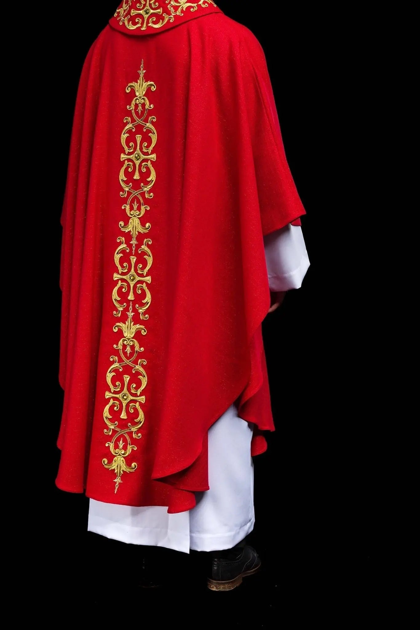 Red chasuble richly embroidered with stones
