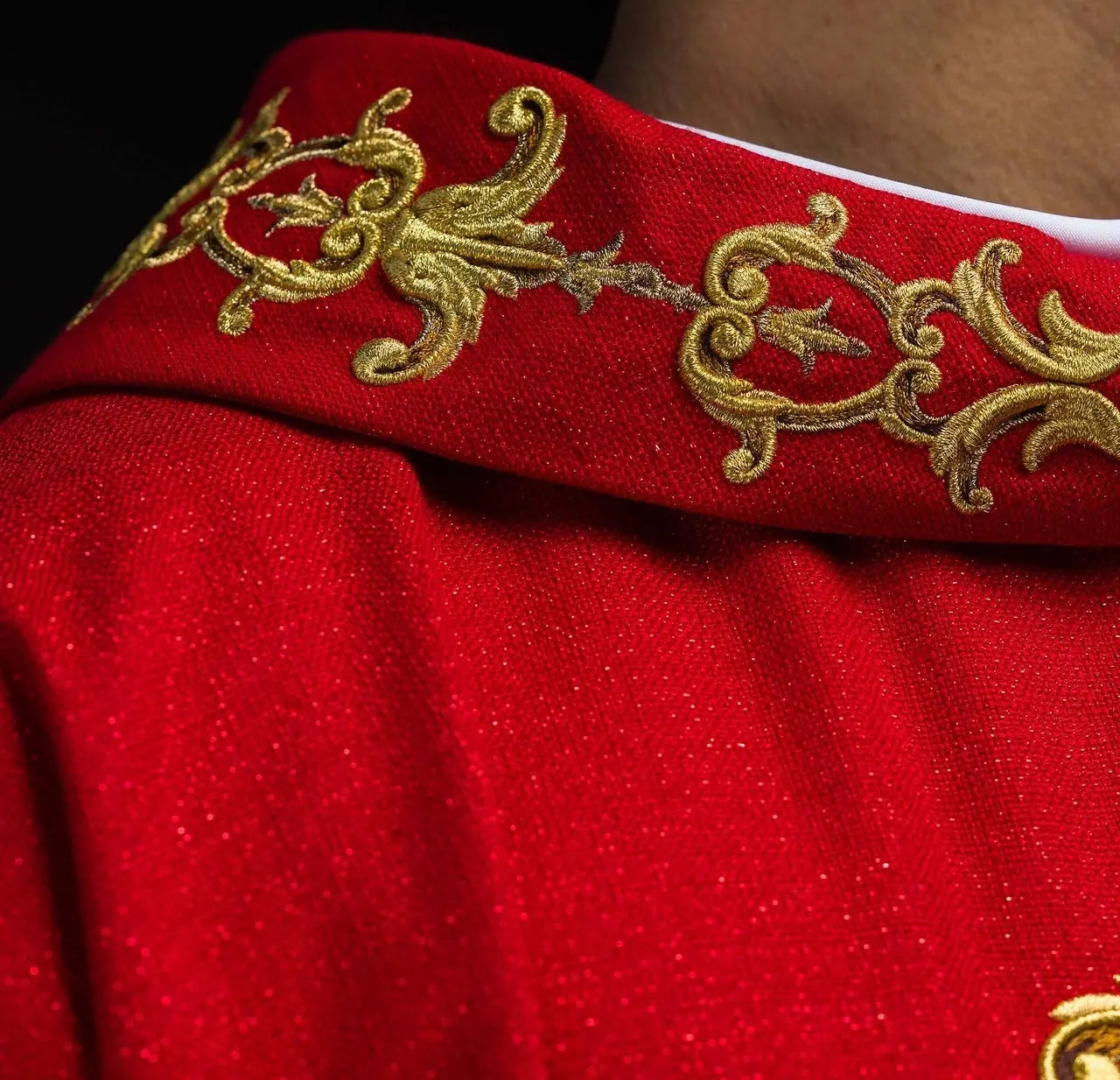 Red chasuble richly embroidered with stones