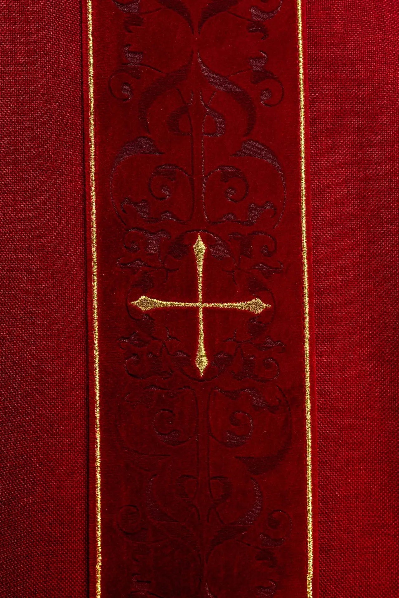 Red chasuble with an embroidered band of crosses