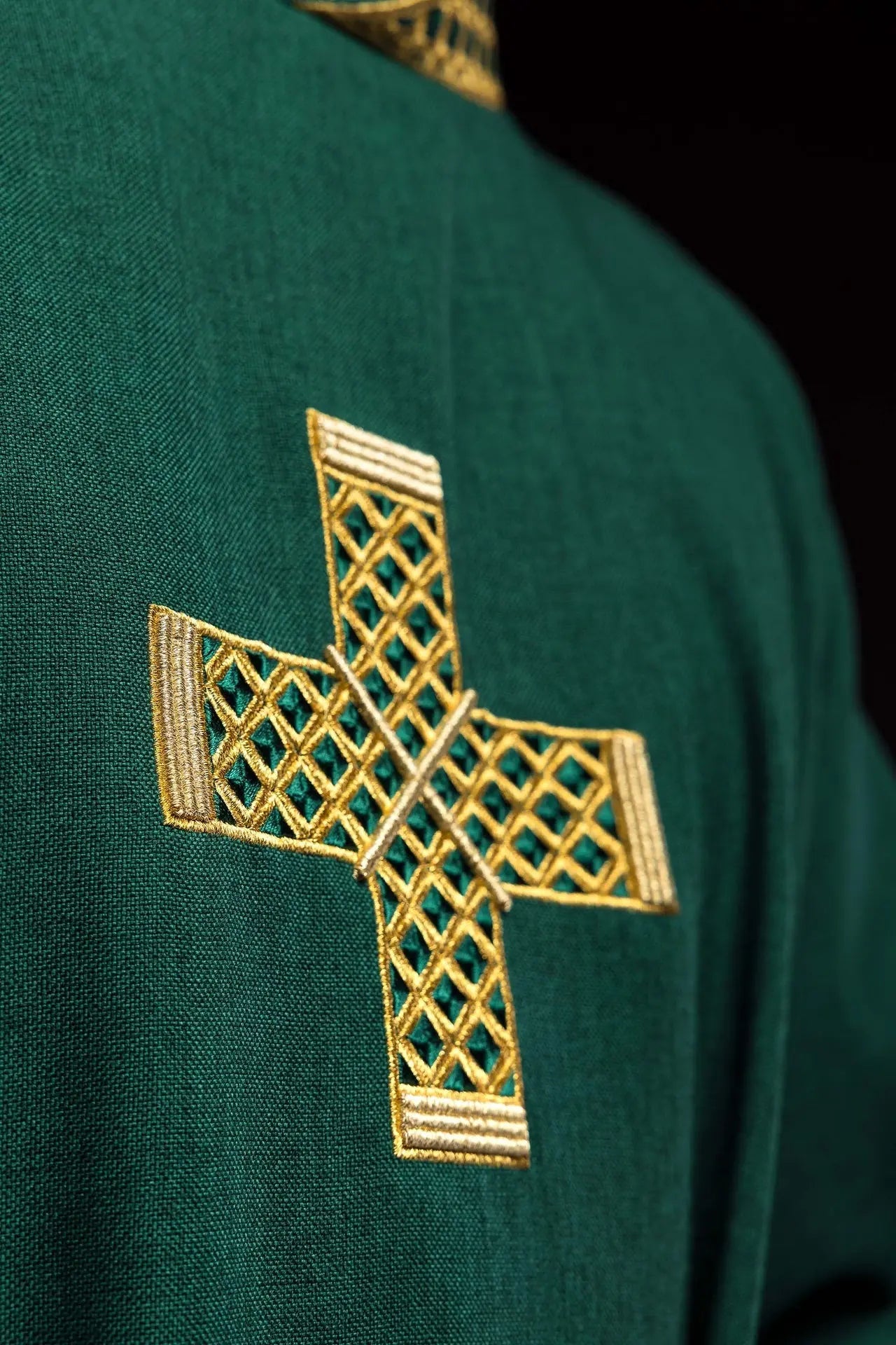 Green dalmatic with embroidered crosses and collar