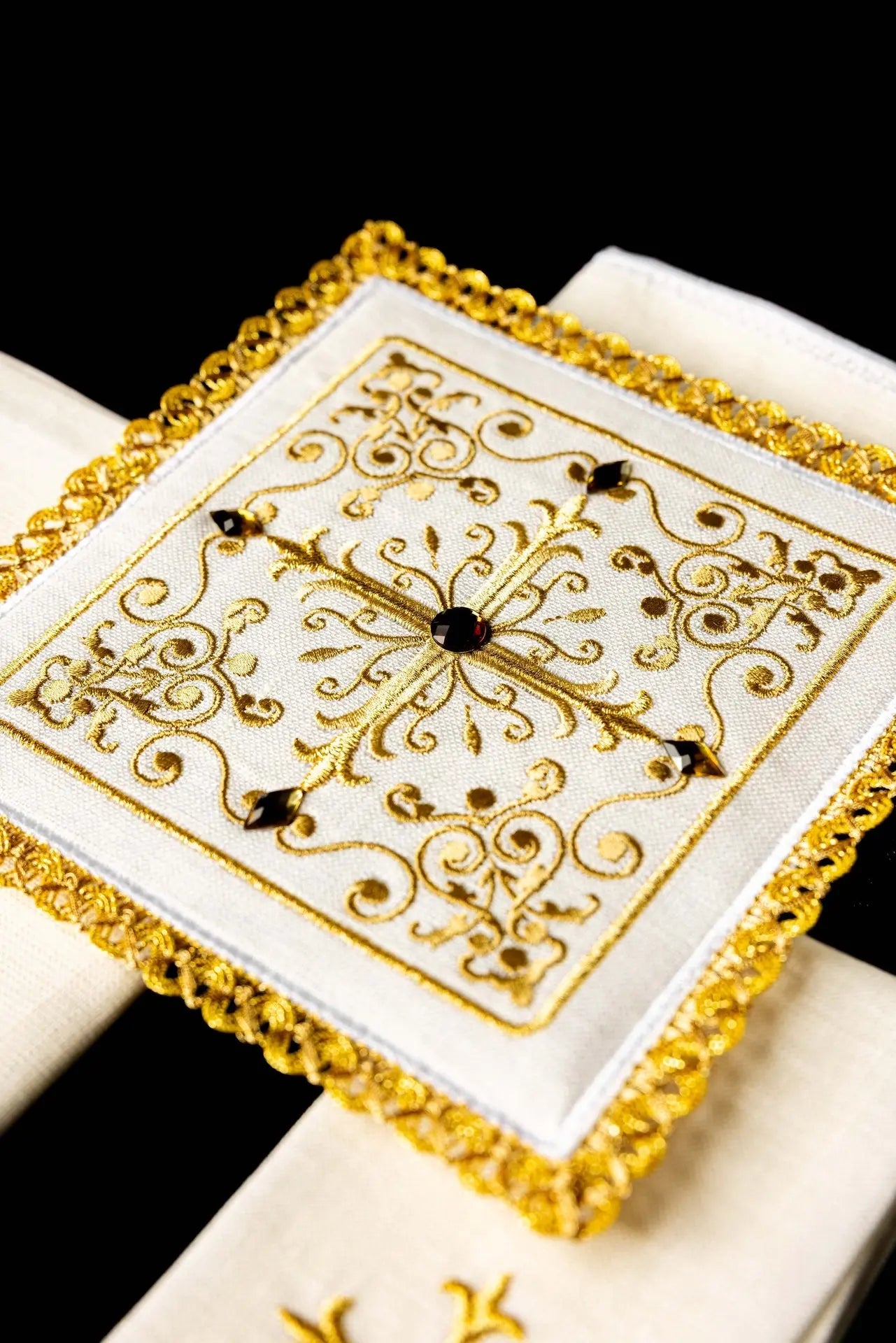 Richly decorated linen cup set with cross embroidery
