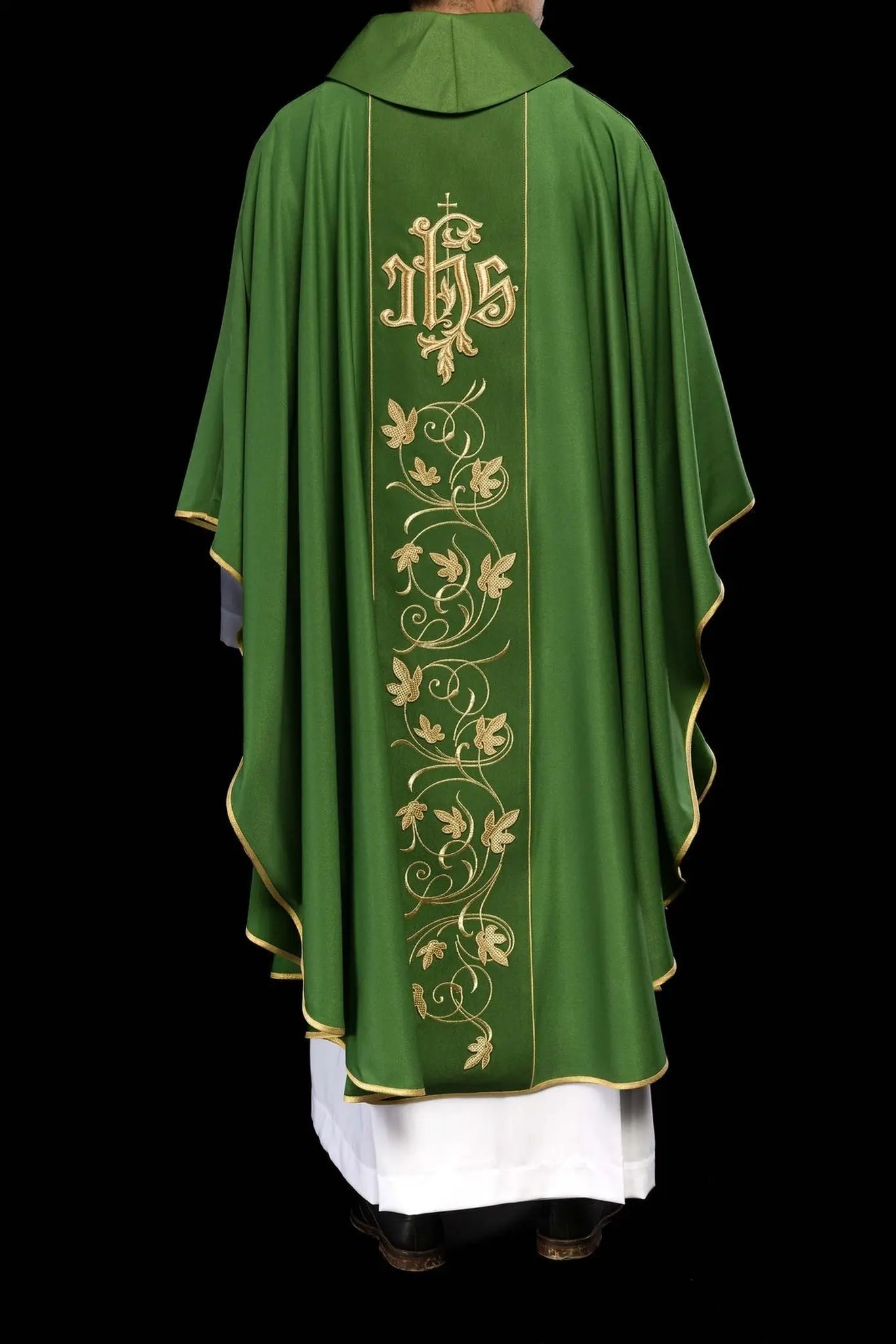 Green liturgical chasuble with richly decorated belt with floral motif and IHS