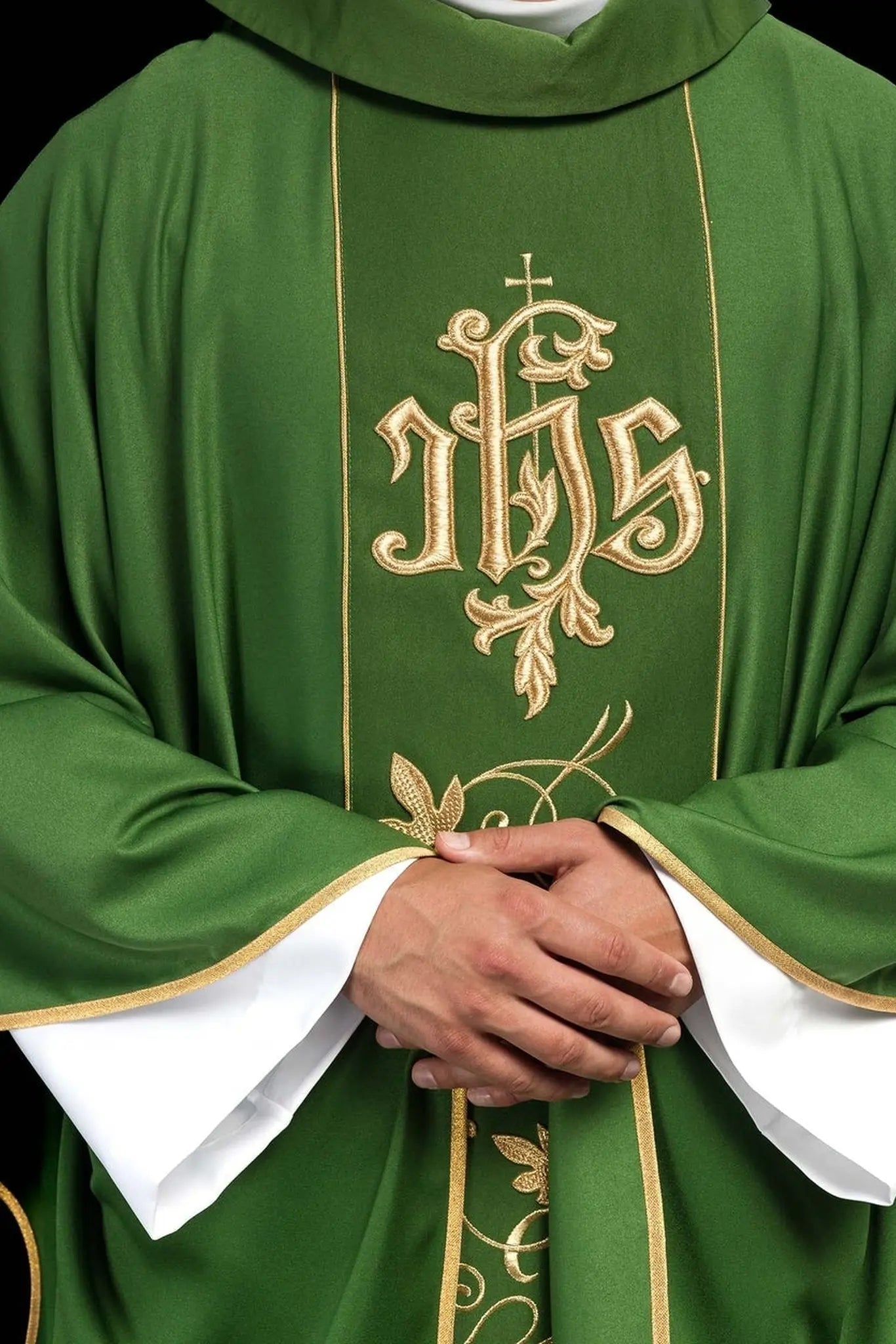 Green liturgical chasuble with richly decorated belt with floral motif and IHS