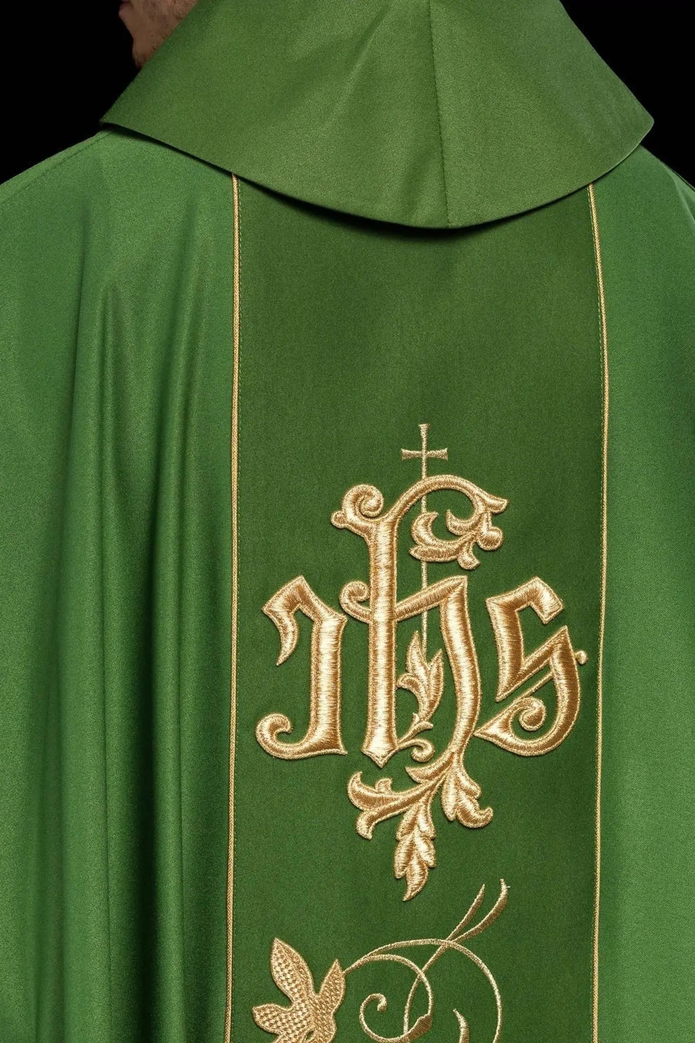 Green liturgical chasuble with richly decorated belt with floral motif and IHS