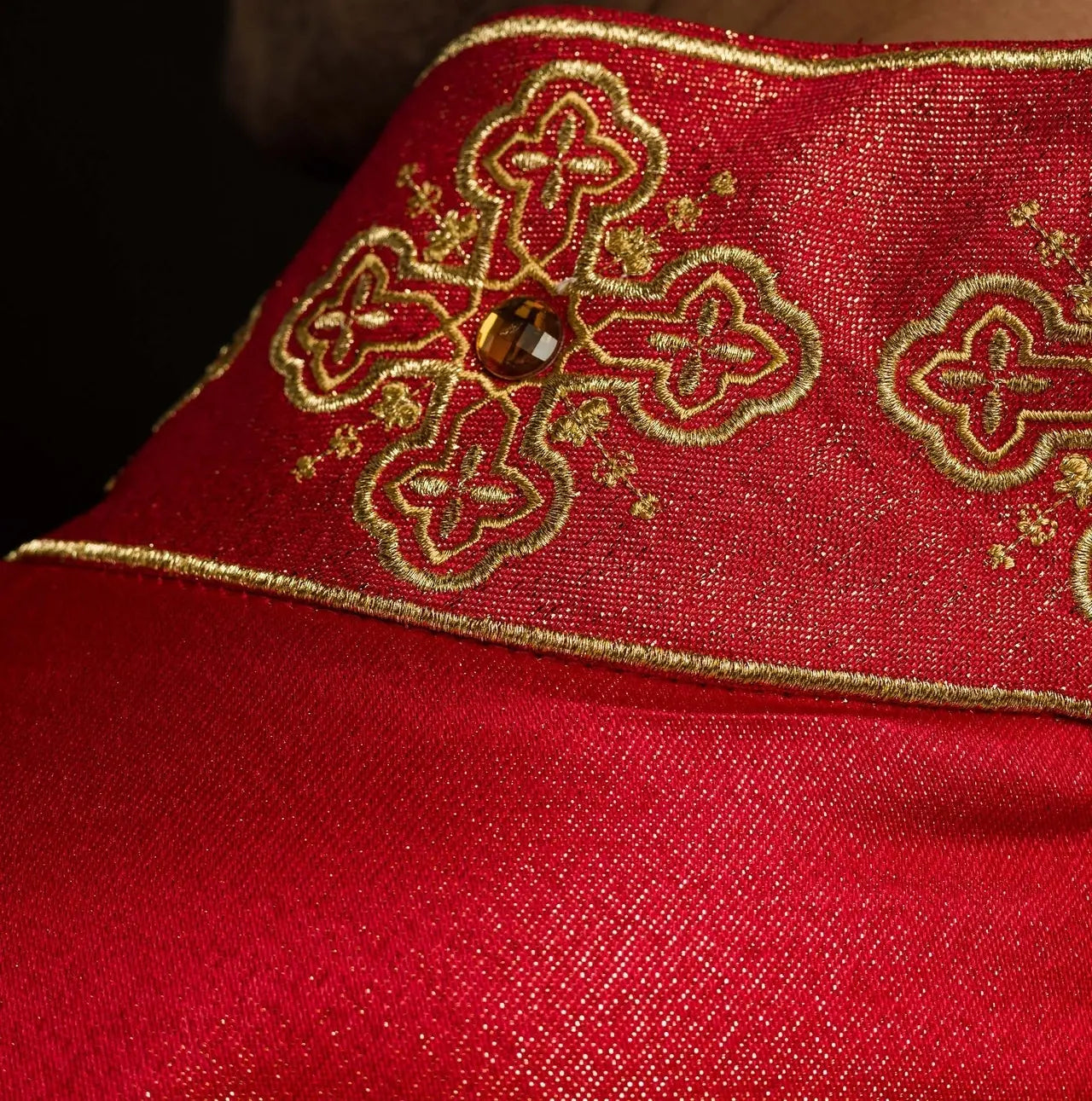 Chasuble in red with embroidered belt and collar decorated with stones