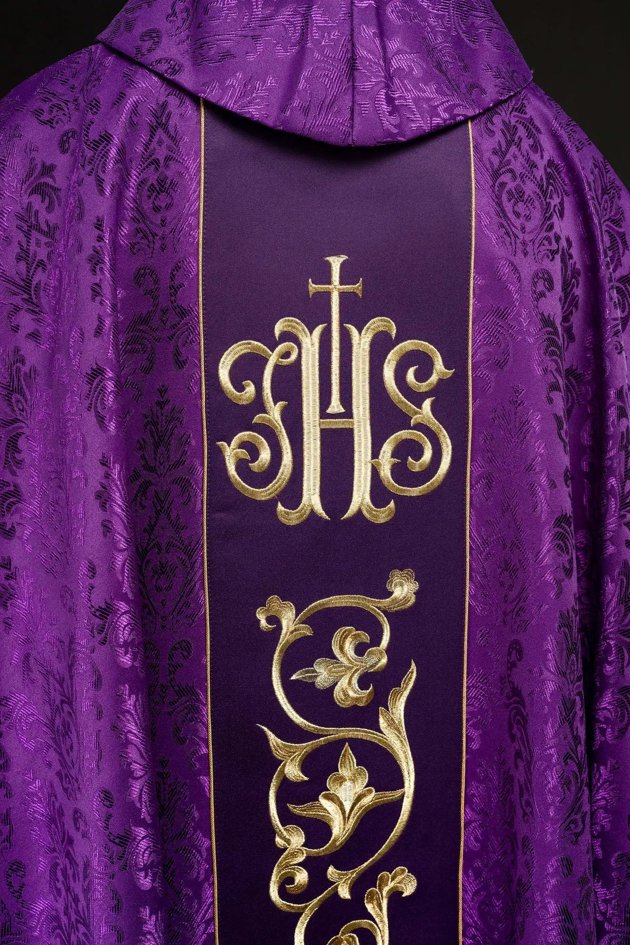 Purple liturgical chasuble with richly decorated IHS belt