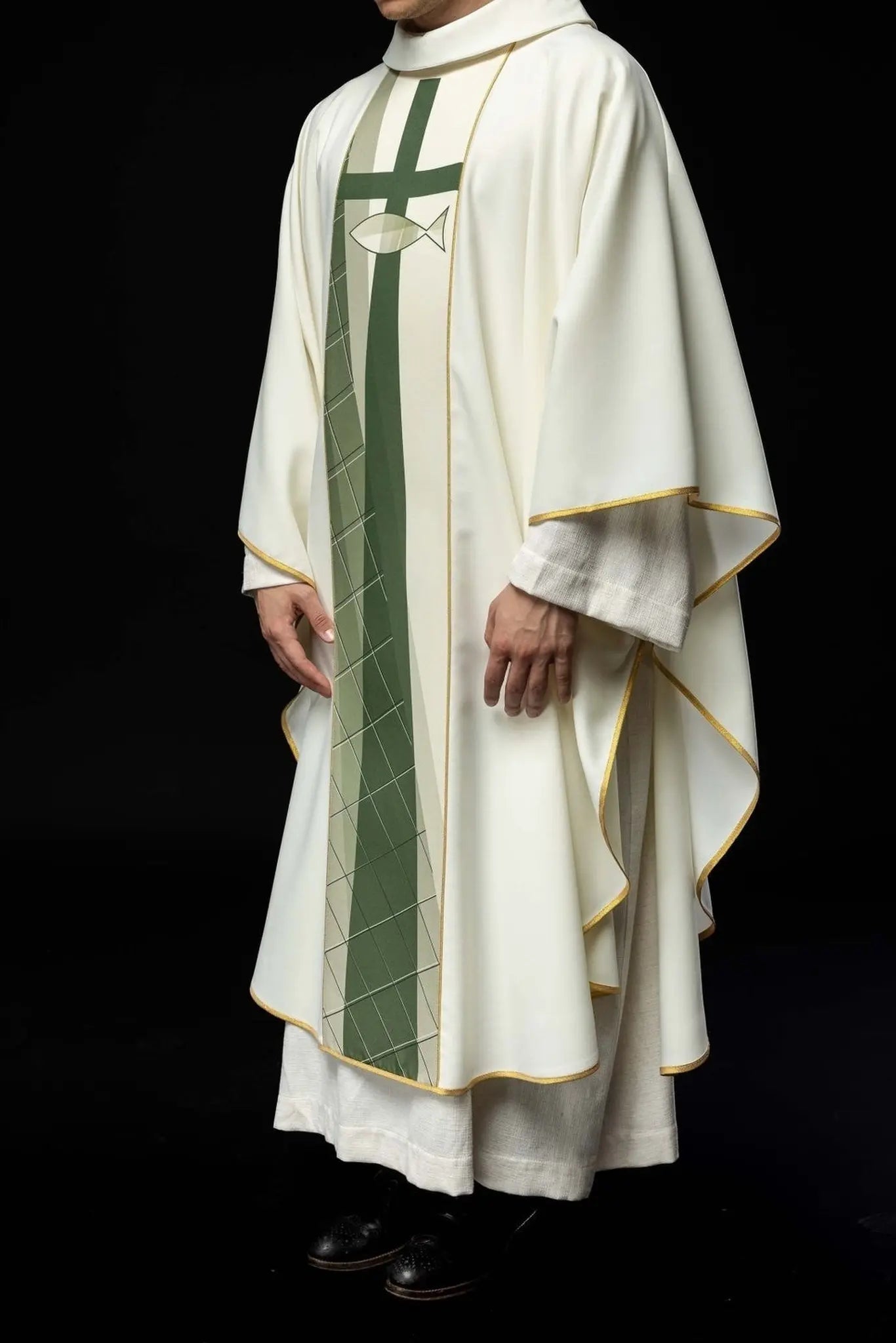White chasuble embroidered with cross and fish pattern