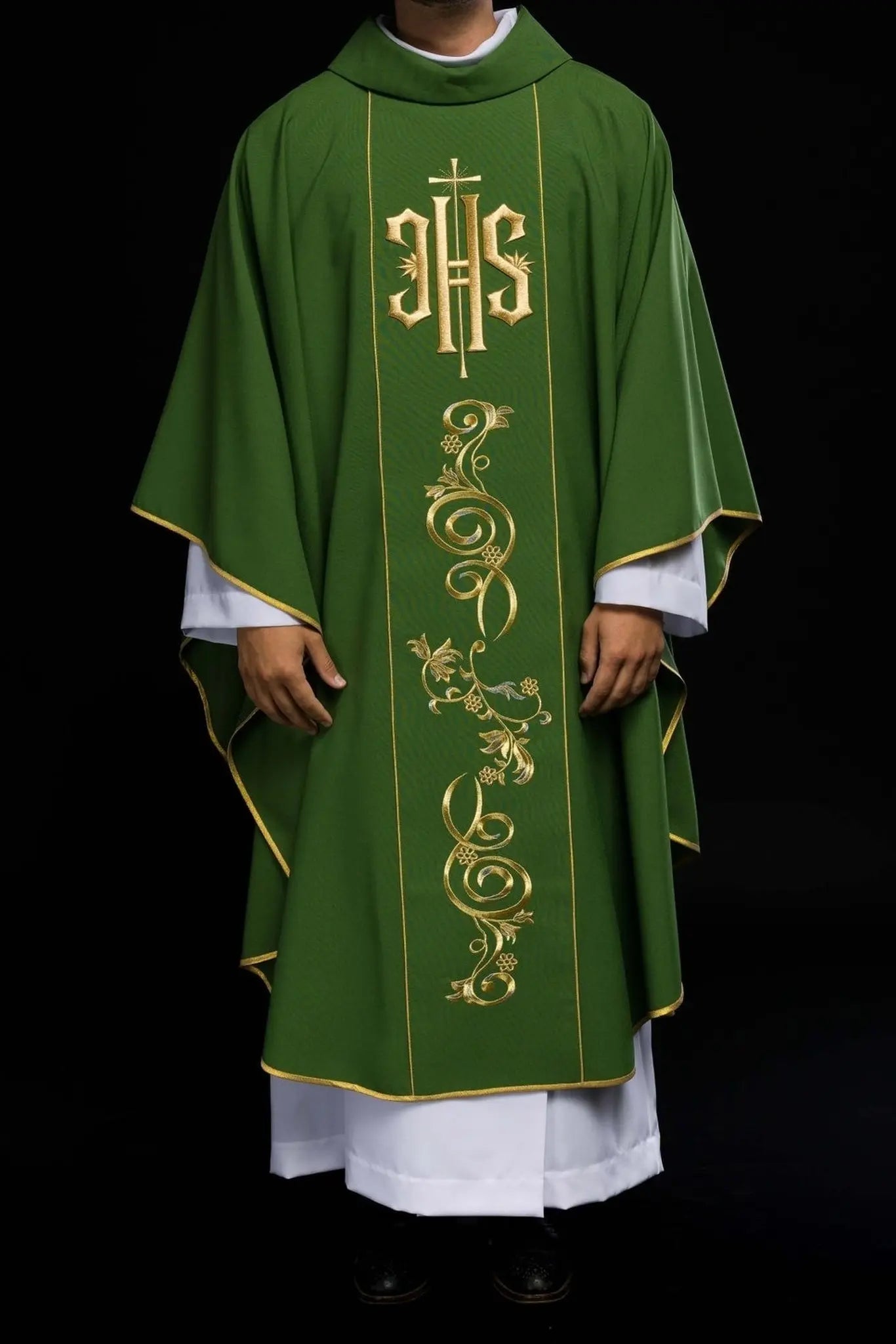 Richly decorated green chasuble with gold motif and wide IHS band