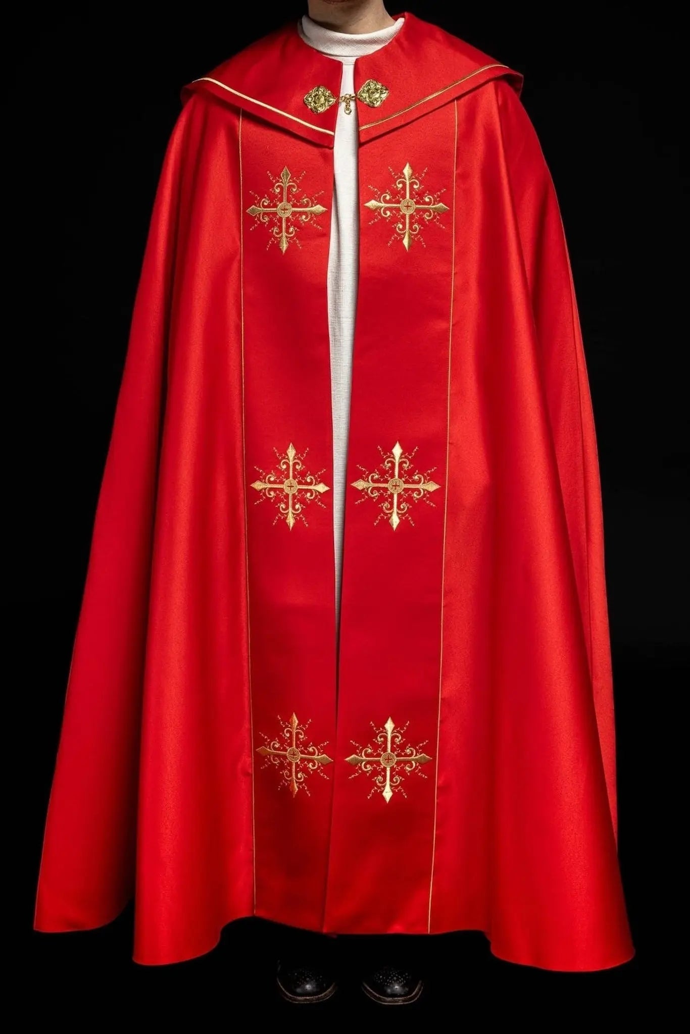 Red liturgical cope with gold crosses embroidery