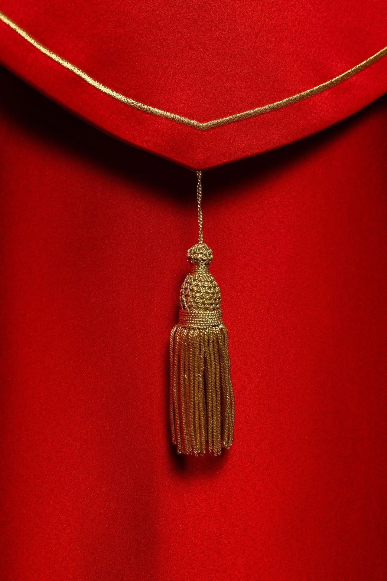 Red liturgical cope with gold crosses embroidery