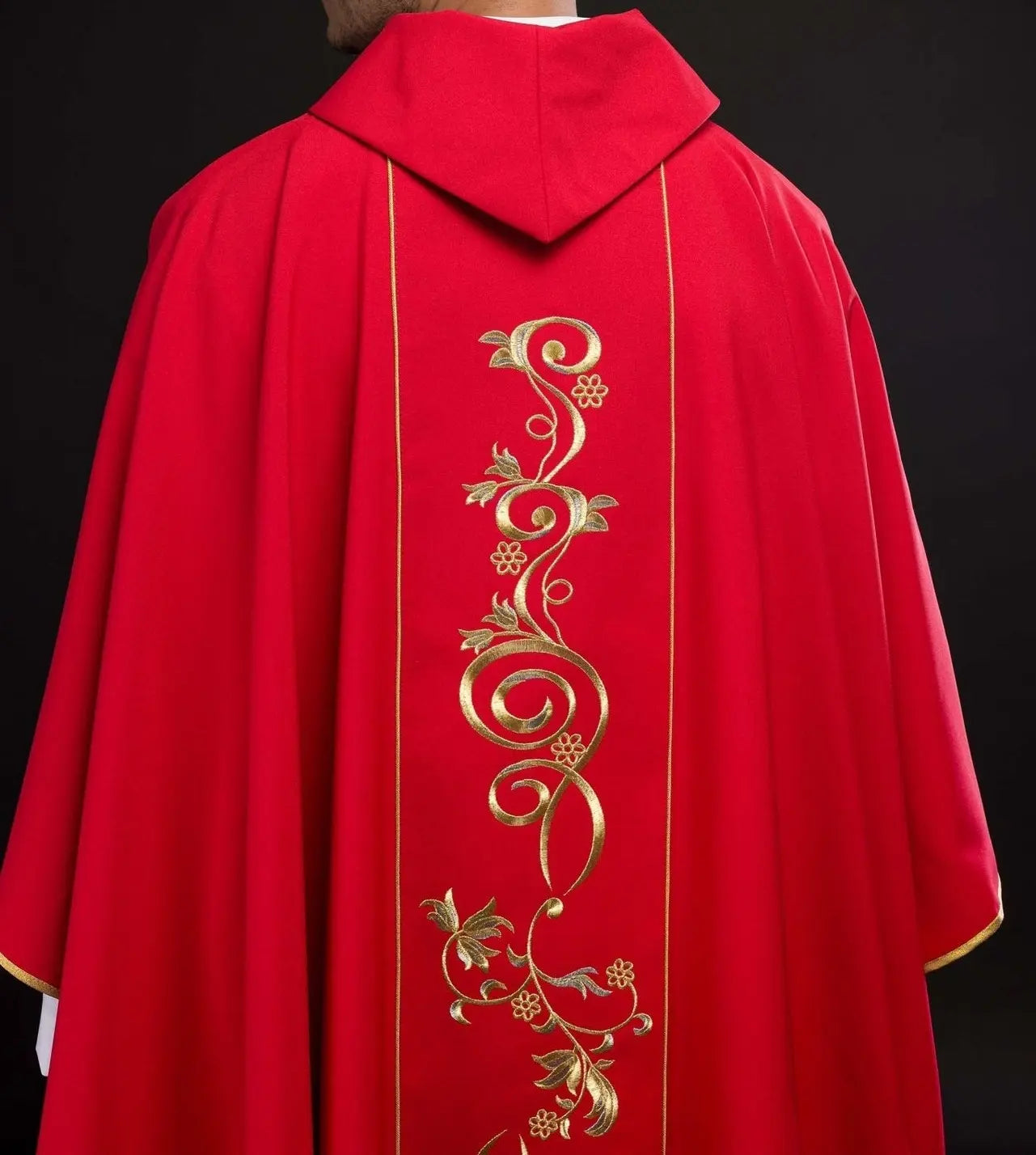 Red chasuble embroidered with IHS