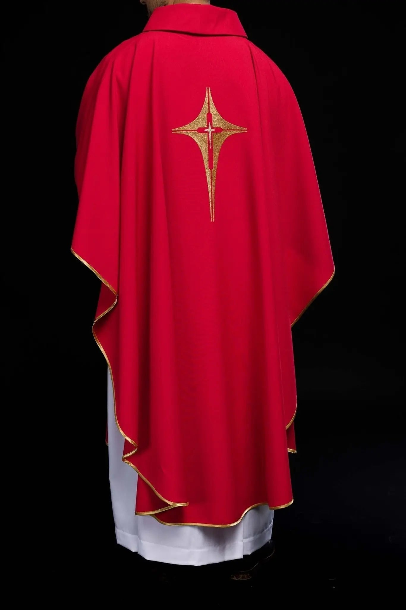 Red chasuble embroidered with cross motif