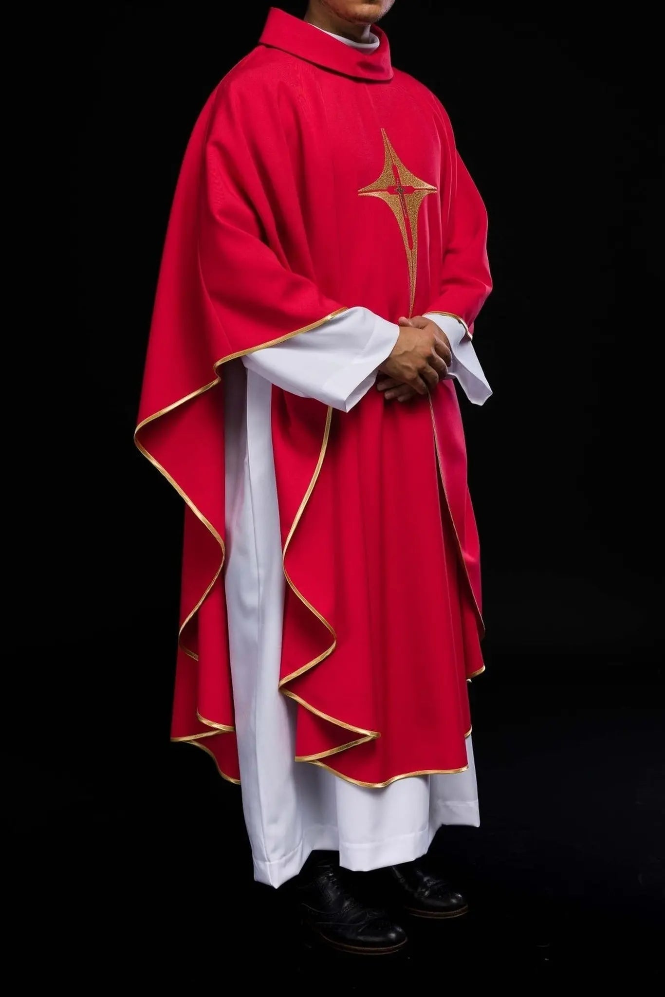 Red chasuble embroidered with cross motif