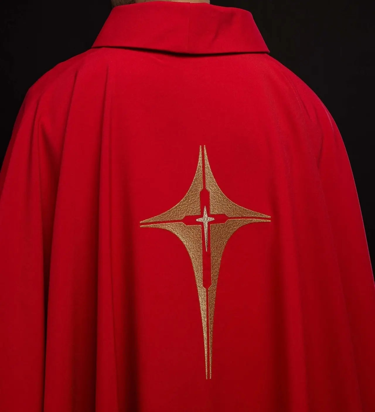 Red chasuble embroidered with cross motif