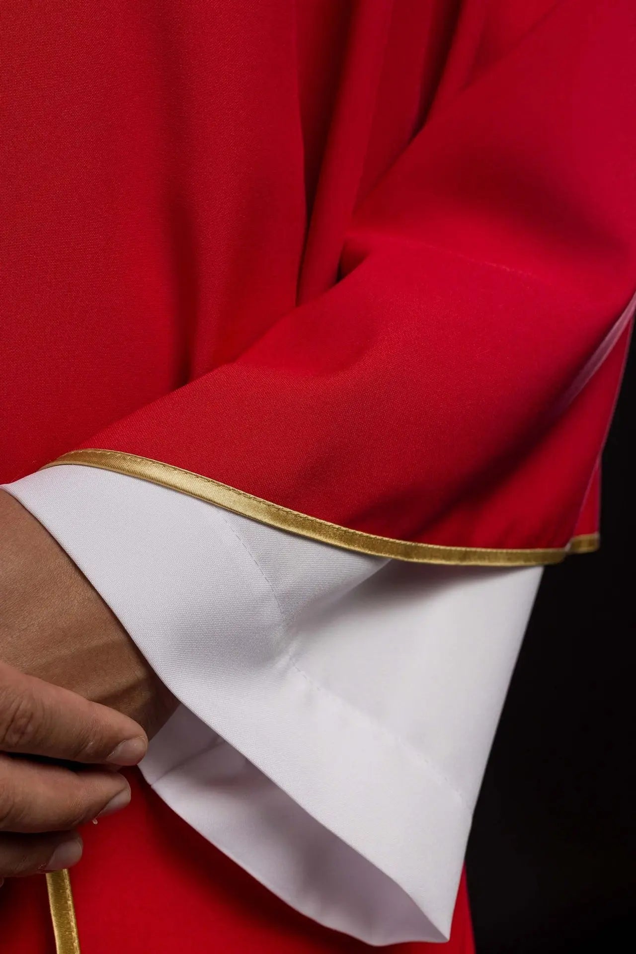 Red chasuble embroidered with cross motif