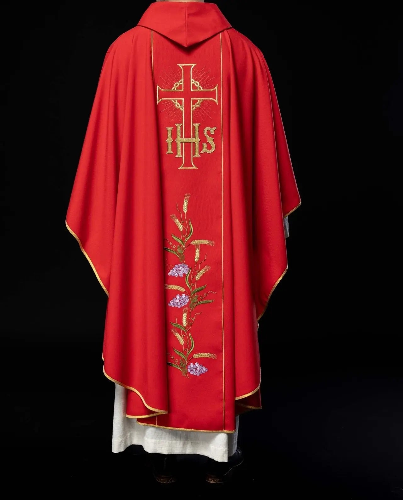 Red chasuble with decorated gold belt with IHS and ears