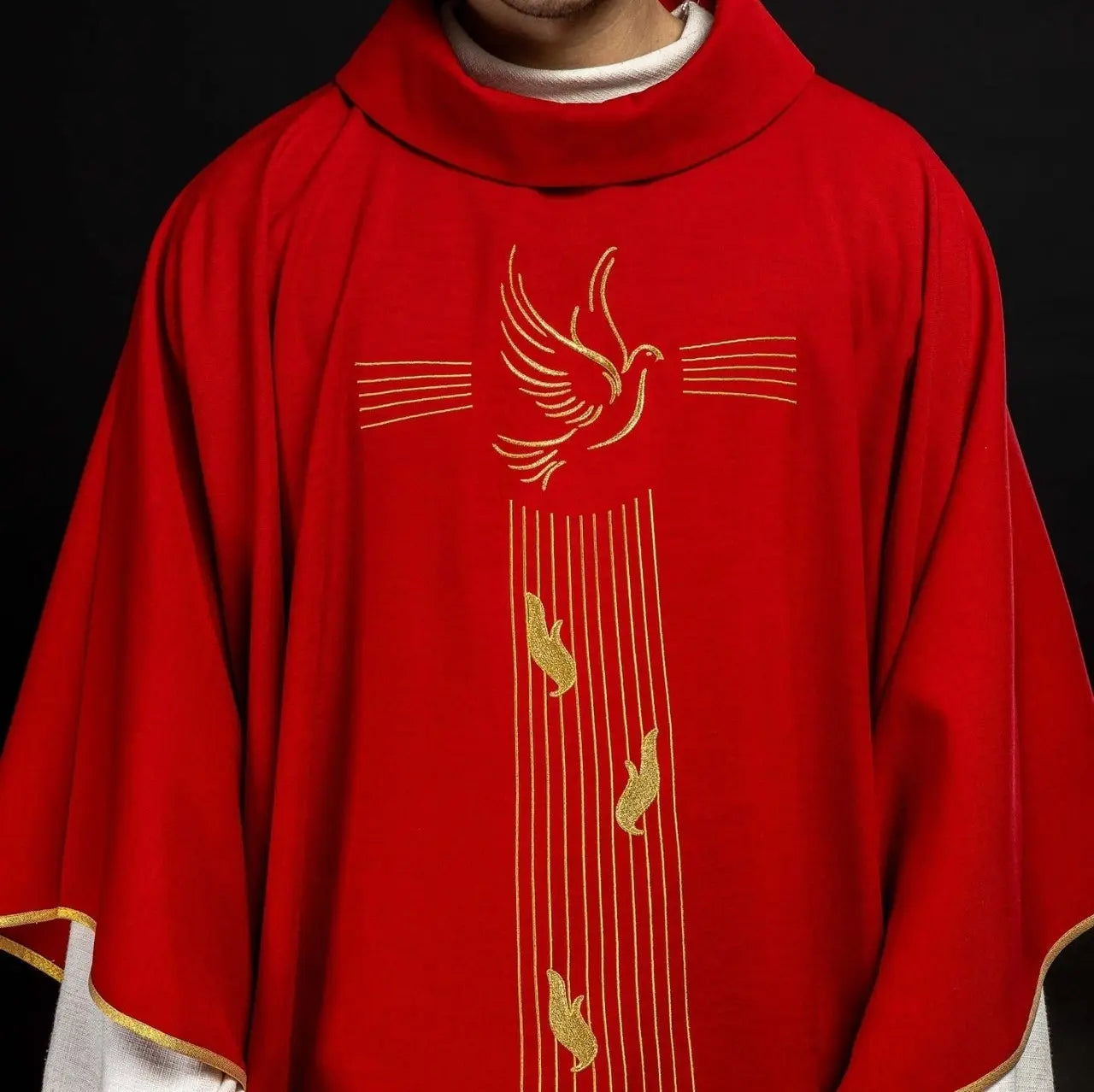 Red chasuble with gold trim and Holy Spirit embroidery