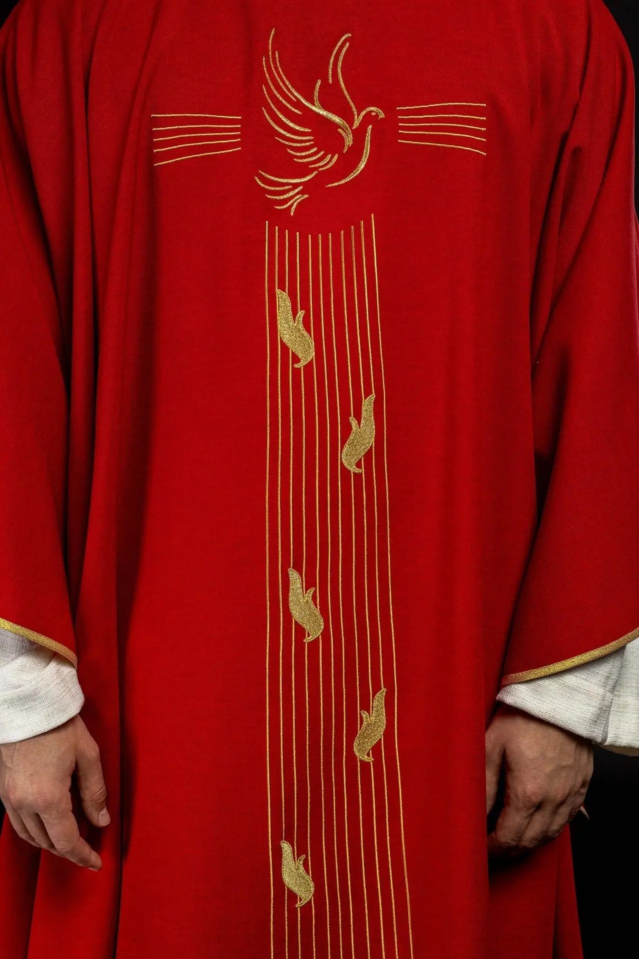 Red chasuble with gold trim and Holy Spirit embroidery