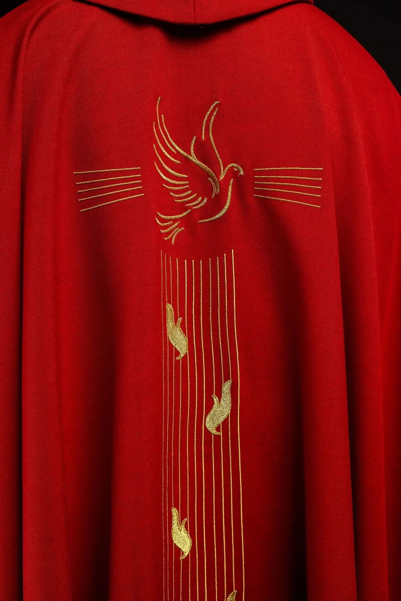 Red chasuble with gold trim and Holy Spirit embroidery