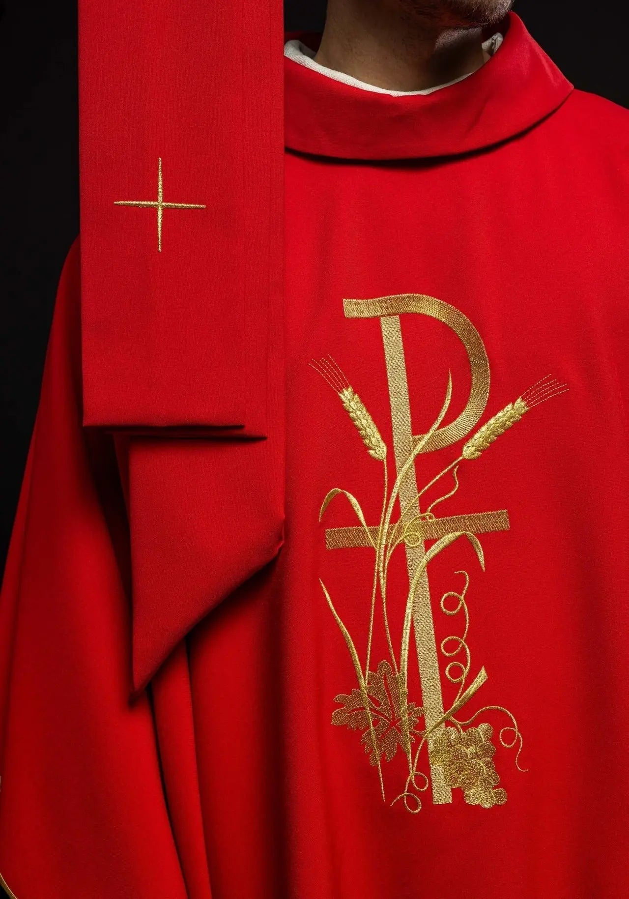 Red chasuble with gold cross embroidery
