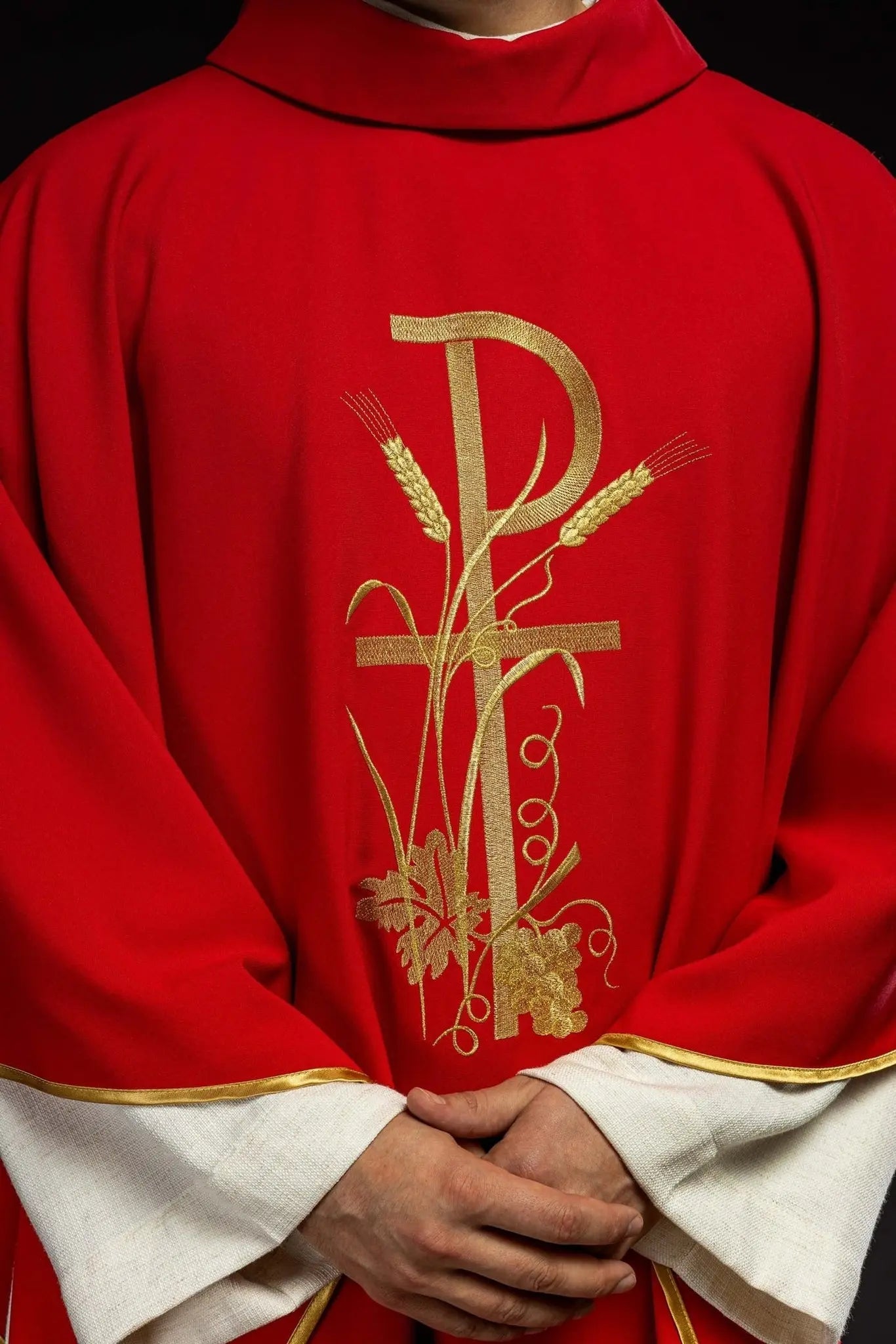 Red chasuble with gold cross embroidery